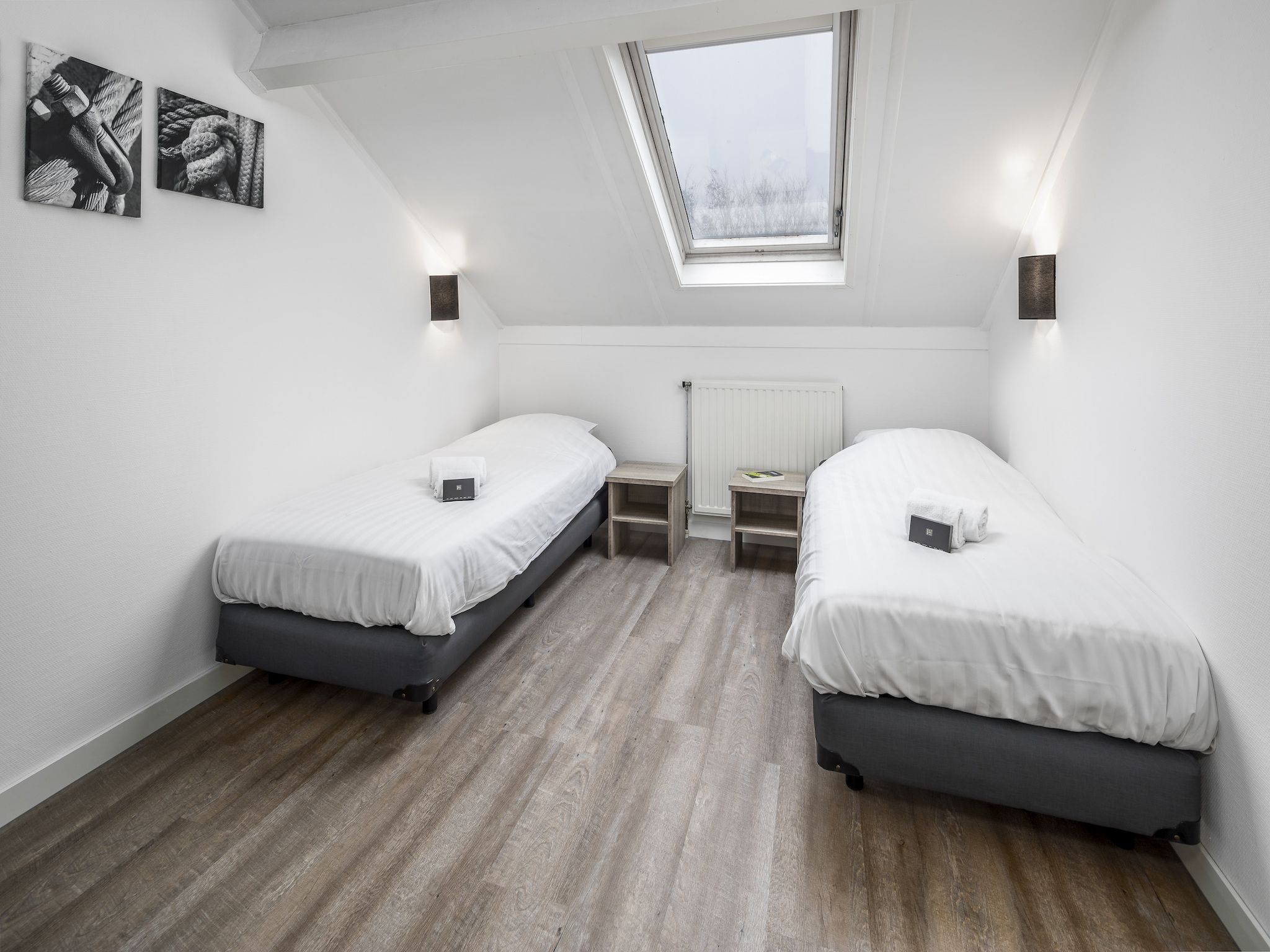 Een slaapkamer van Vakantiepark Soeten Haert 13 in Renesse