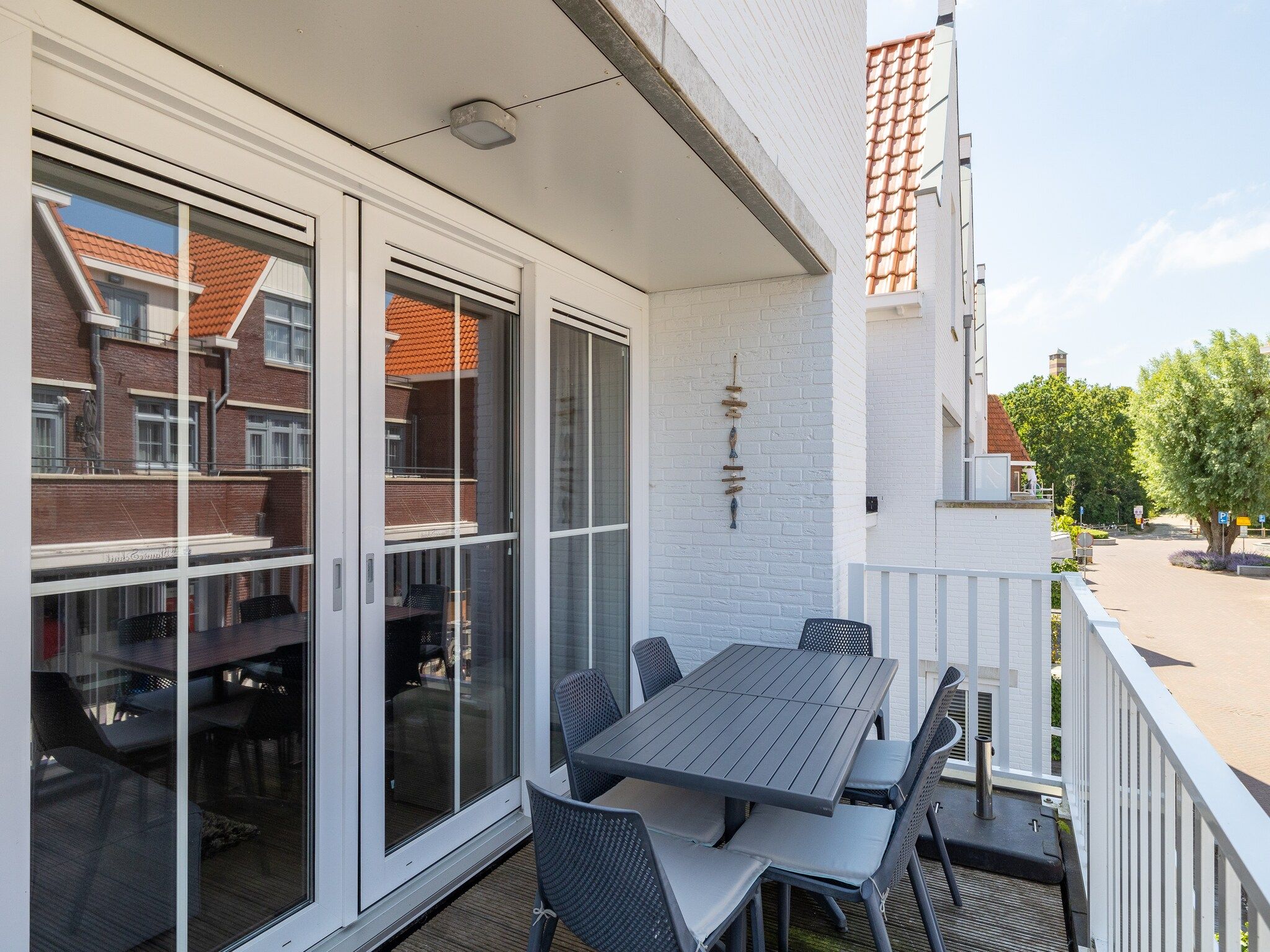 Het terras van appartement Kaapduinseweg 13 Dishoek 13D luxe 6p sauna in Koudekerke