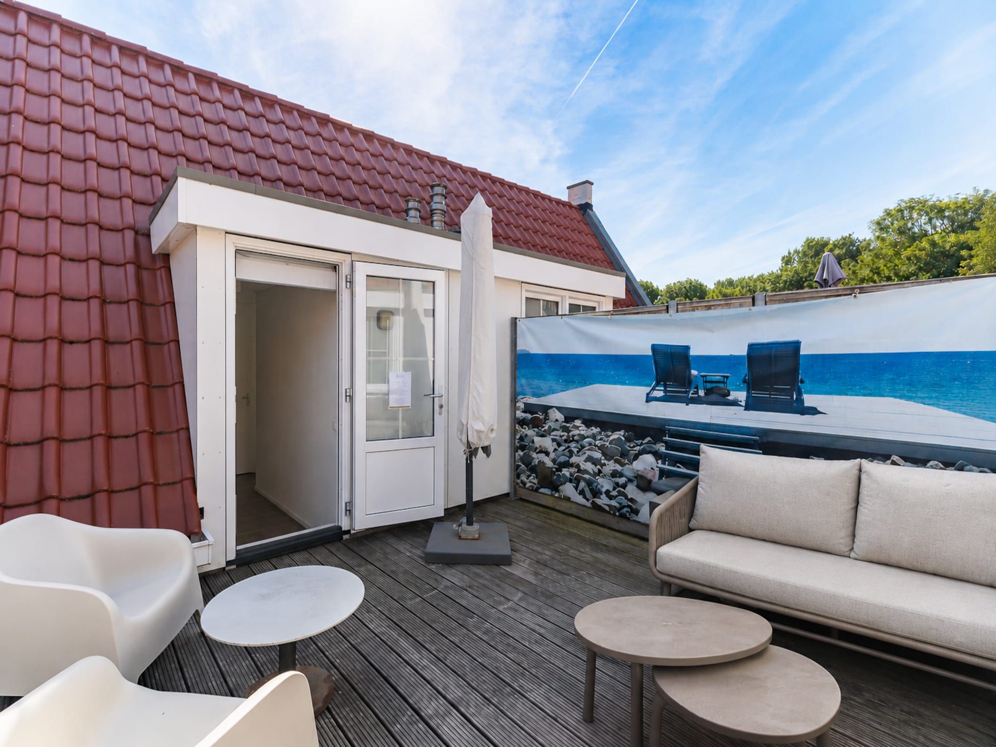 Het terras van appartement Kaapduinseweg 13 Dishoek 13D luxe 6p sauna in Koudekerke
