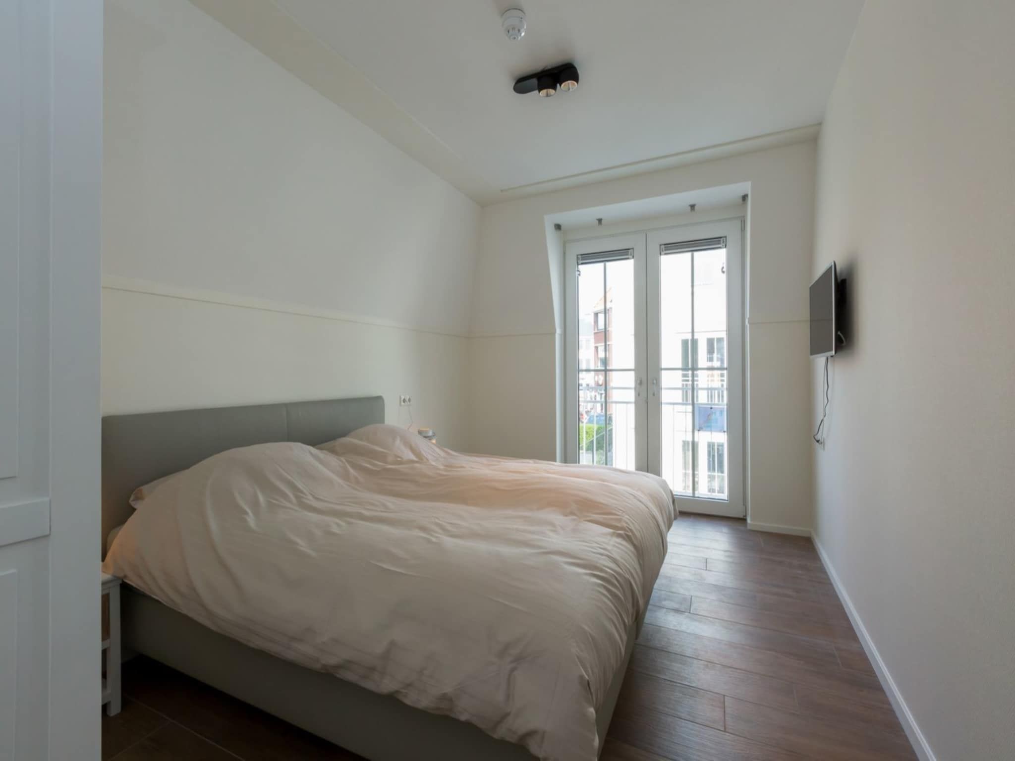 Een slaapkamer van Appartement Duinhof Dishoek 13N - 6 personen in Koudekerke