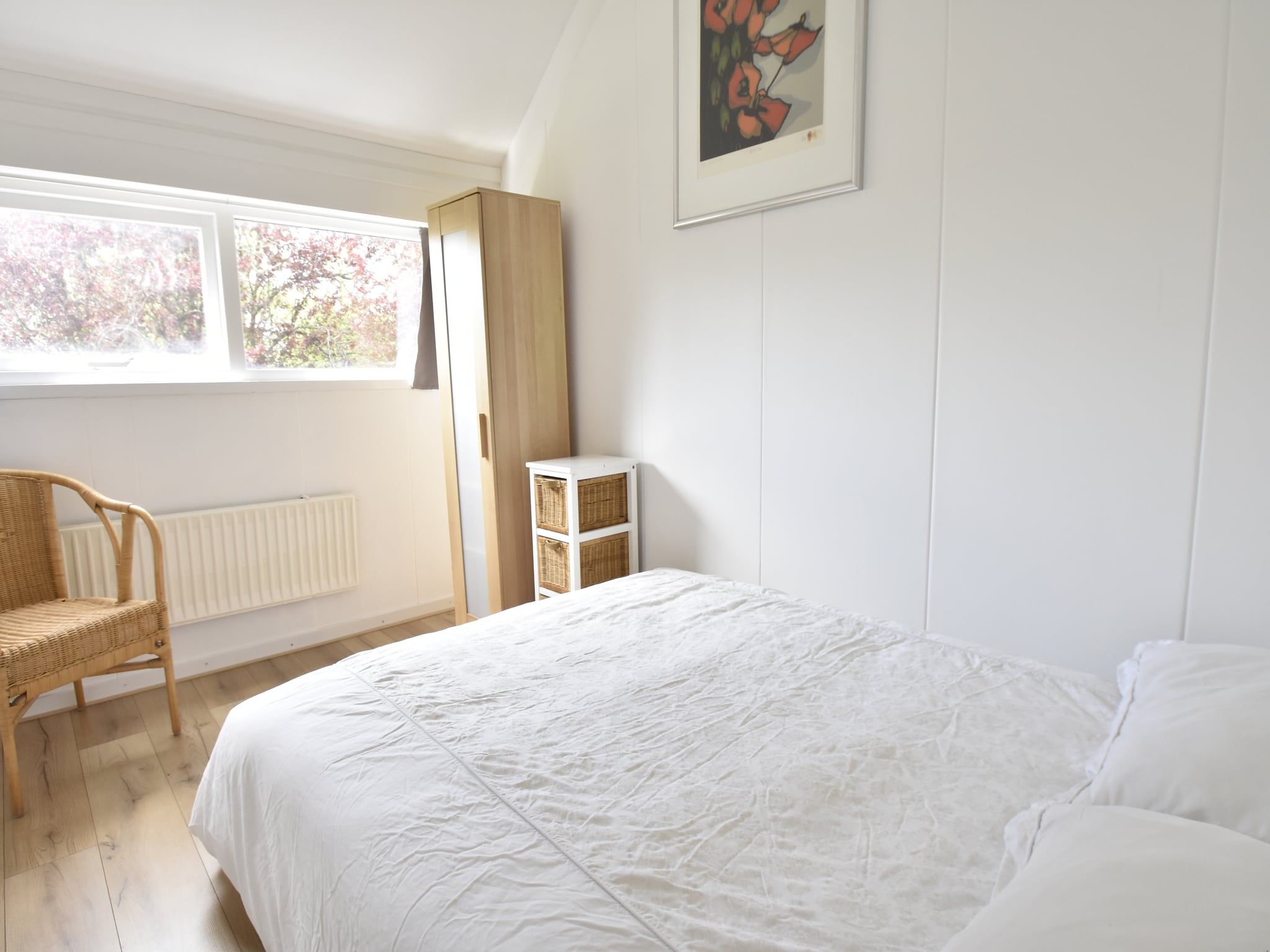 Een slaapkamer van De Reker Zon in Warmenhuizen