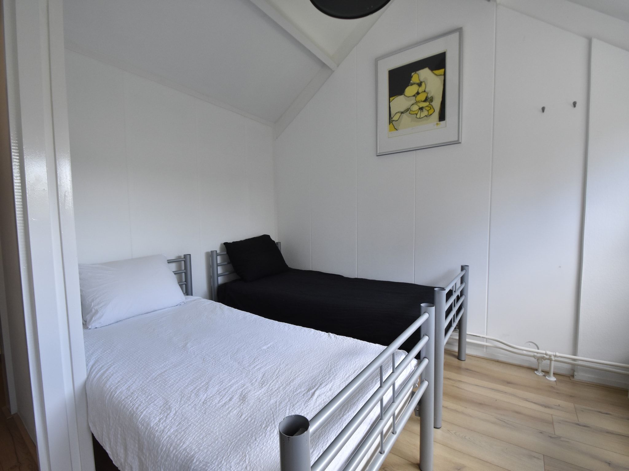 Een slaapkamer van De Reker Zon in Warmenhuizen