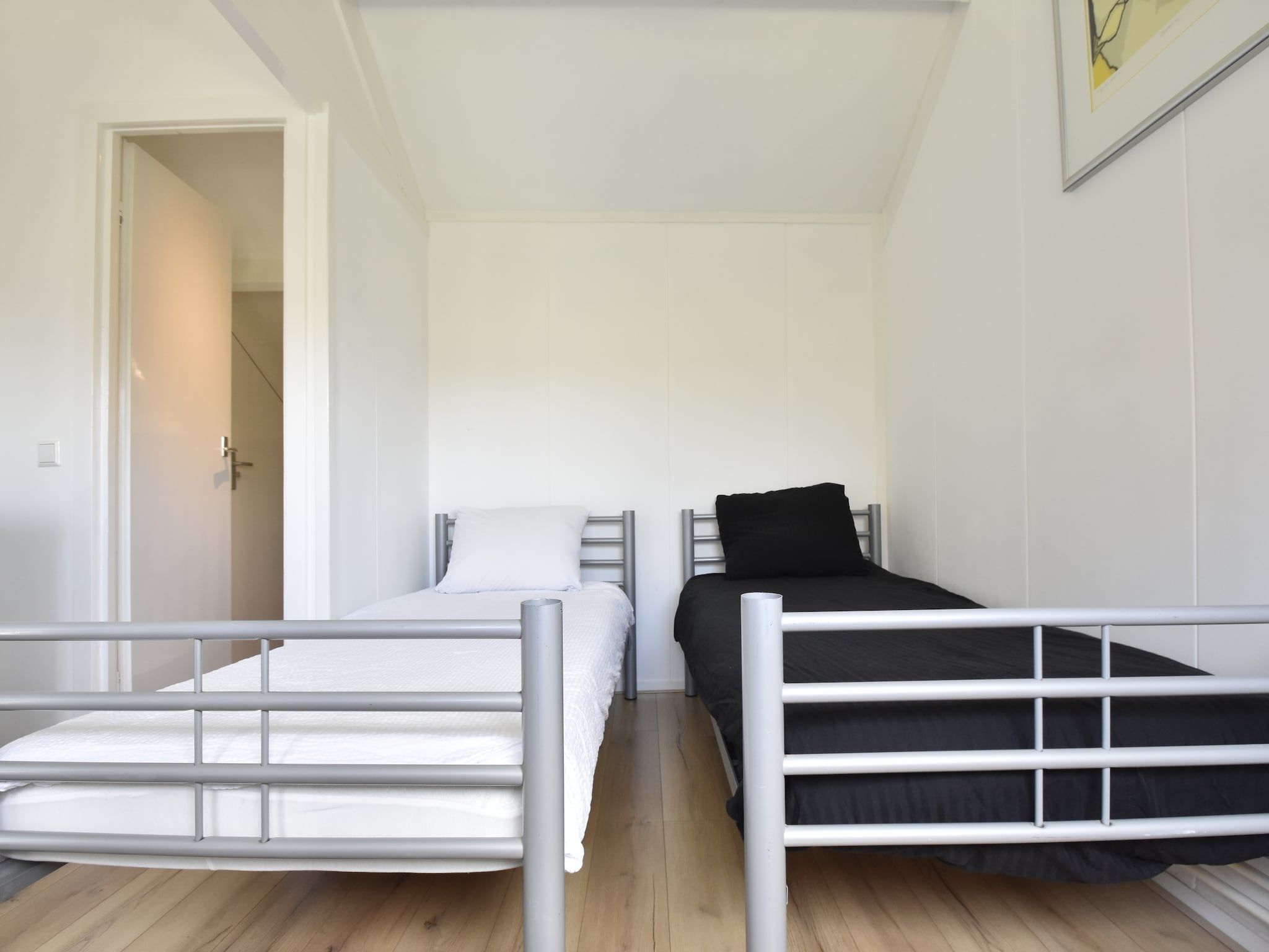 Een slaapkamer van De Reker Zon in Warmenhuizen