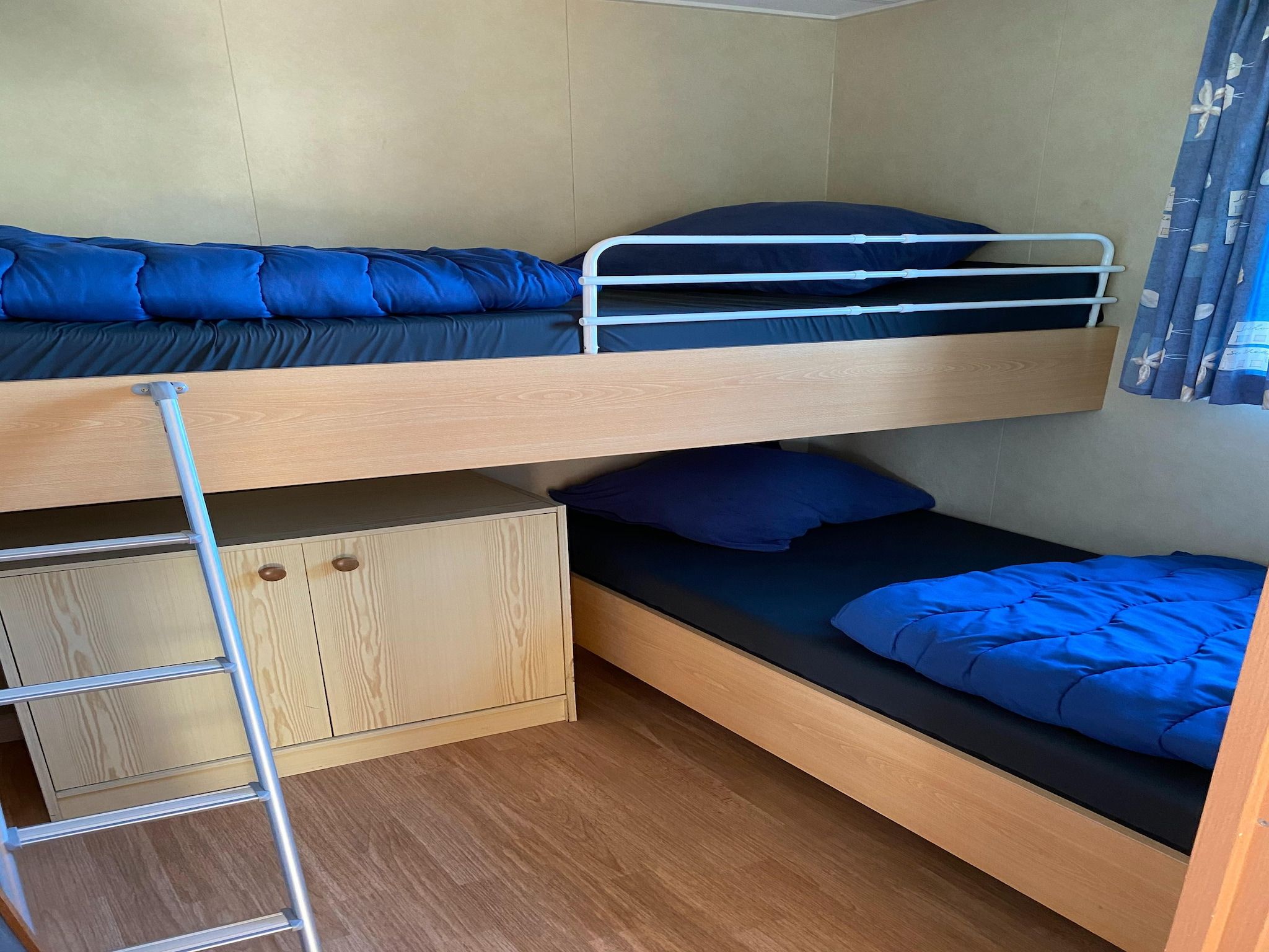 Een slaapkamer van Recreatiepark Duinhoeve 5 in Udenhout