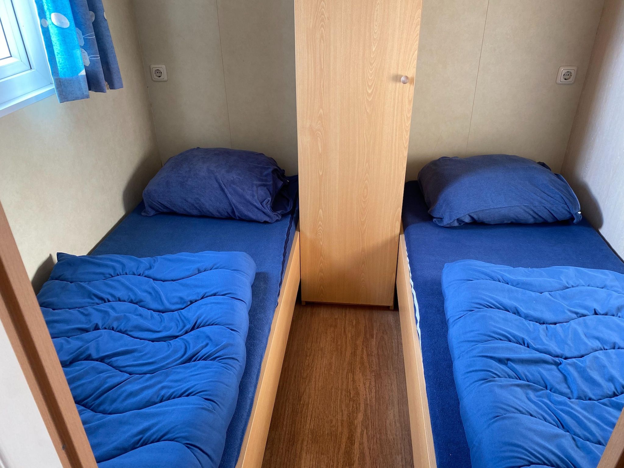 Een slaapkamer van Recreatiepark Duinhoeve 5 in Udenhout