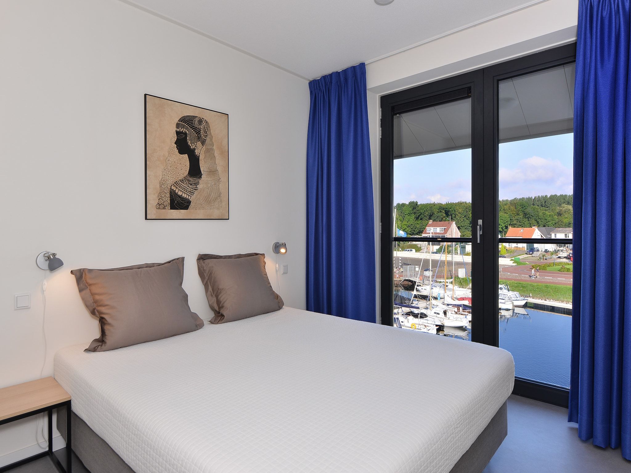 Een slaapkamer van Uithaven 10 F in Kamperland