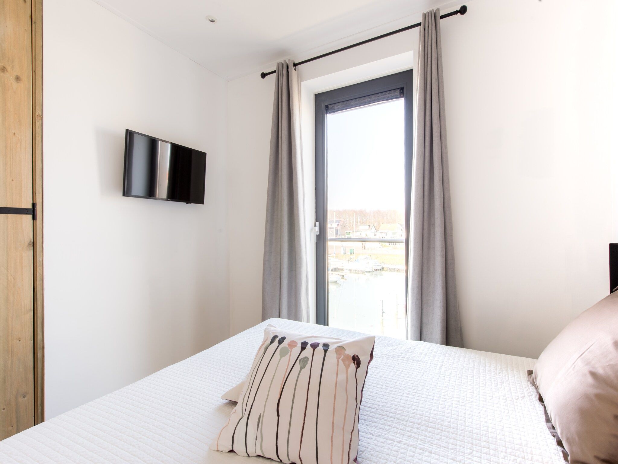 Een slaapkamer van Uithaven 10C in Kamperland