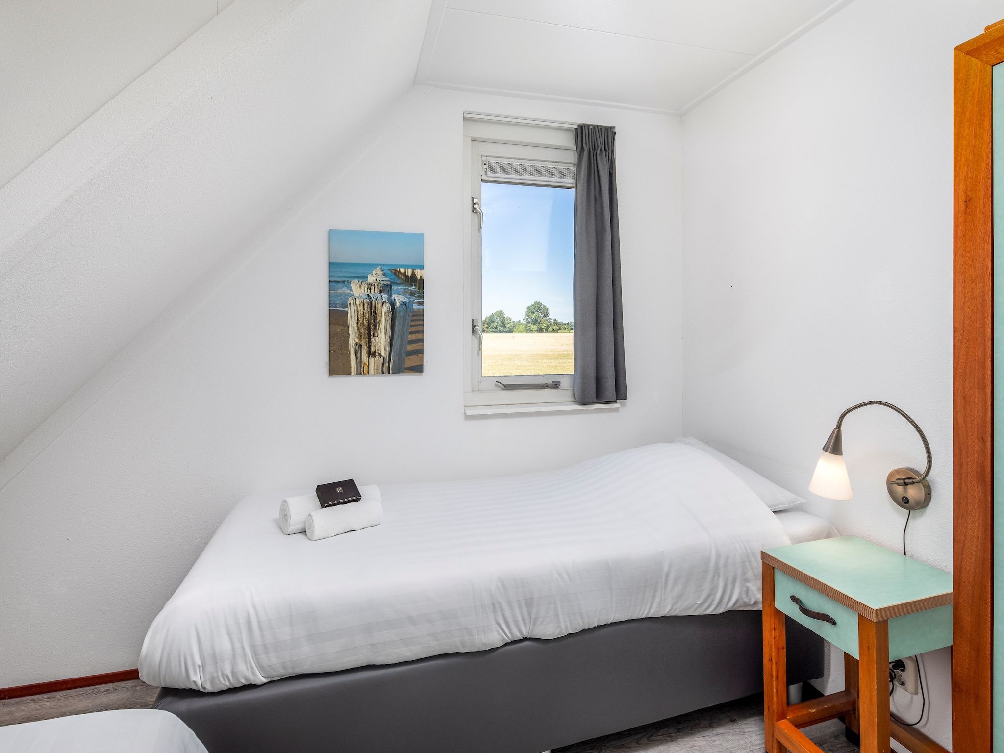 Een slaapkamer van Aquadelta 27 in Bruinisse