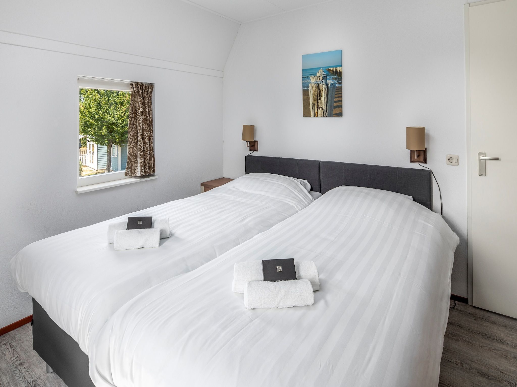 Een slaapkamer van Aquadelta 28 in Bruinisse