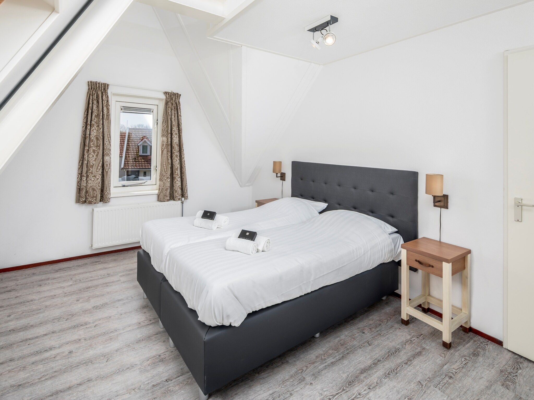 Een slaapkamer van Aquadelta 31 in Bruinisse