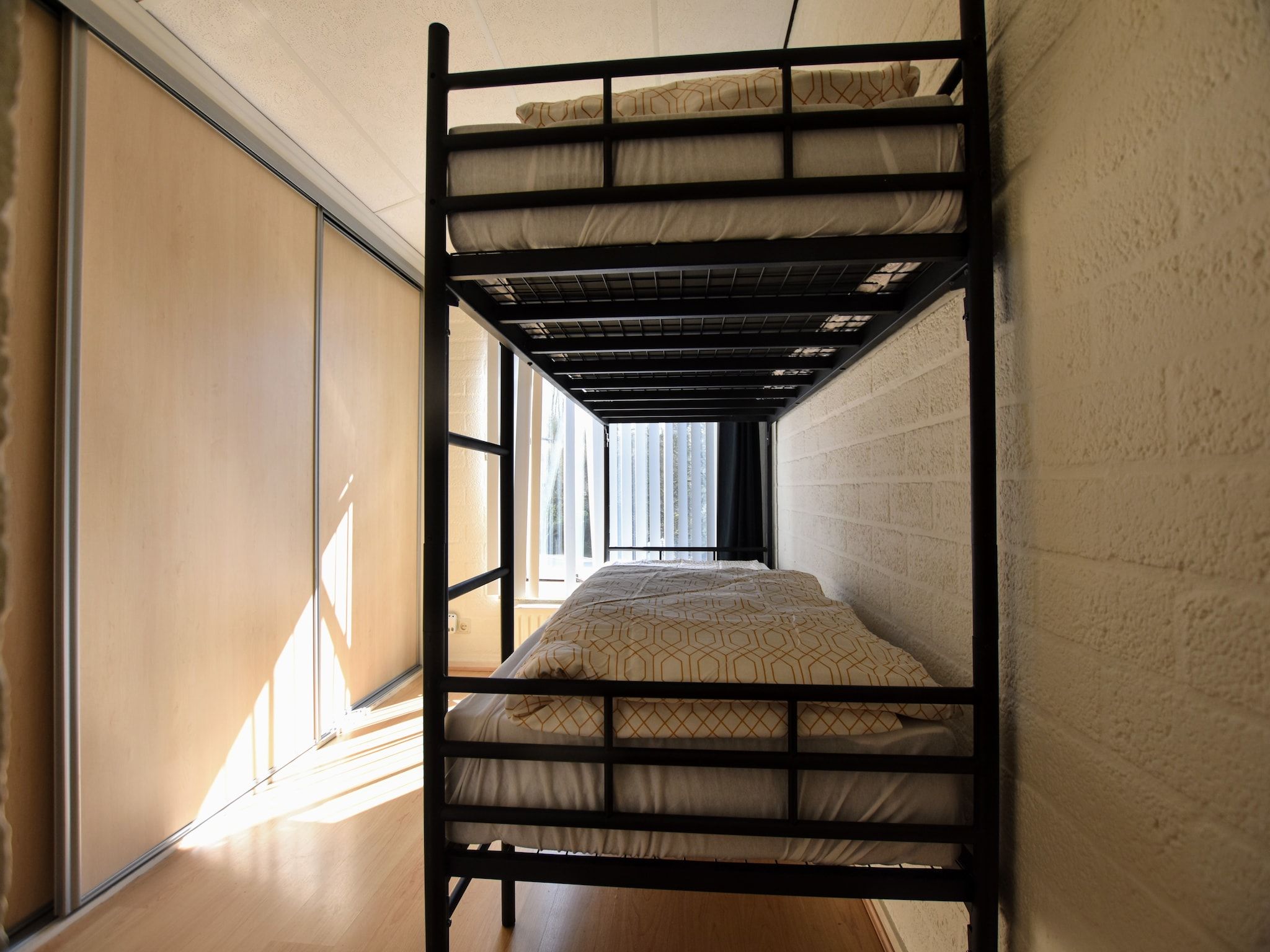 Een slaapkamer van Geulhuisje II in Walem