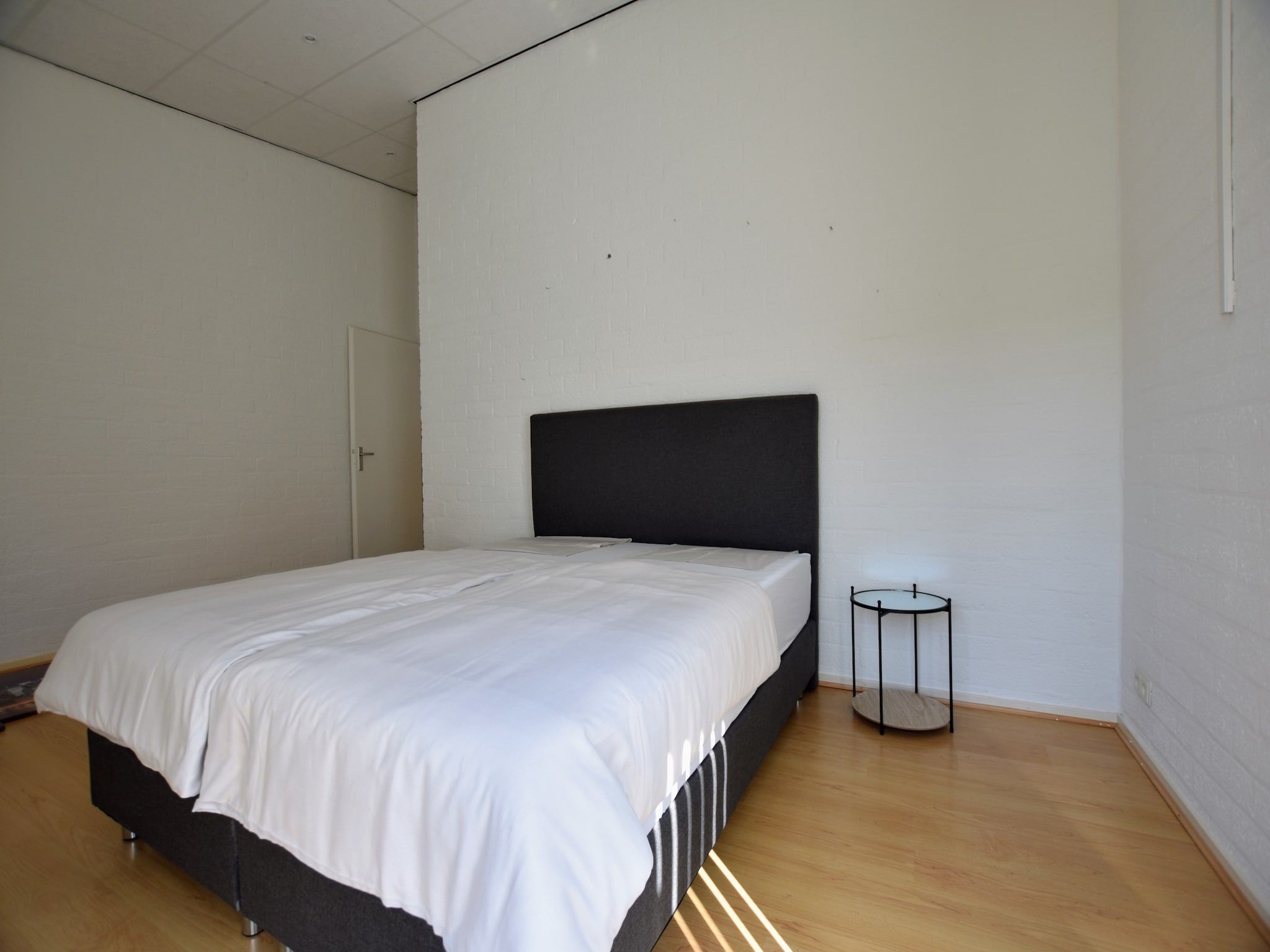 Een slaapkamer van Geulhuisje II in Walem