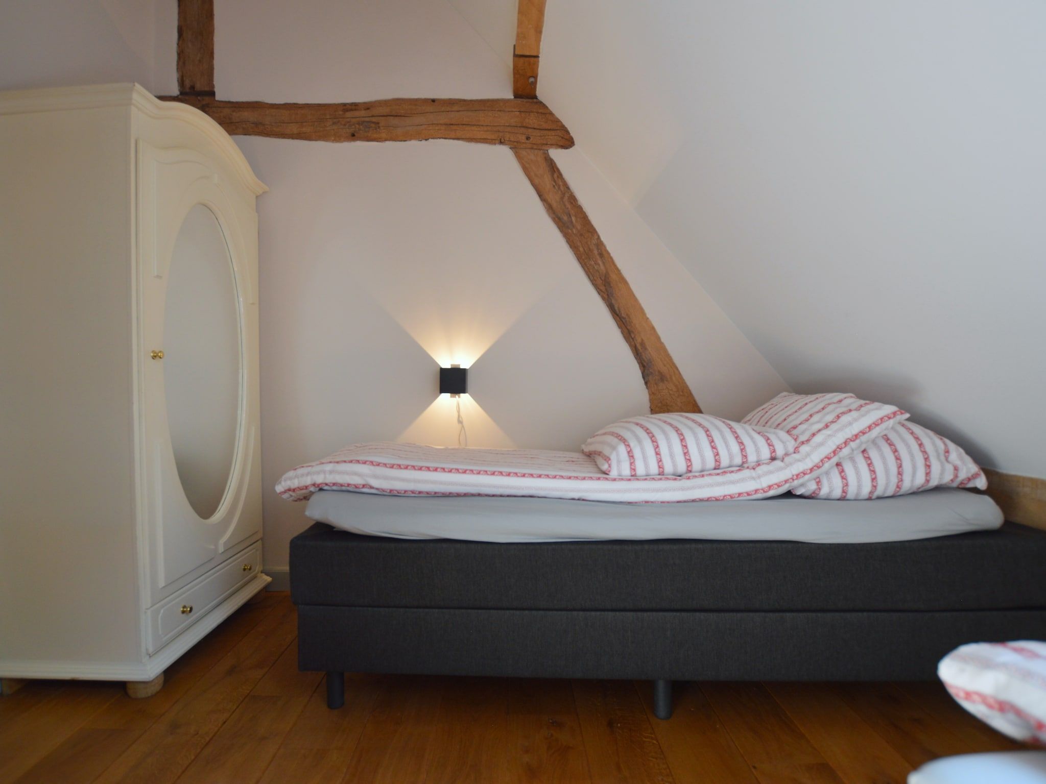 Een slaapkamer van Hoeve A Gen Water- Donderblumke in Slenaken