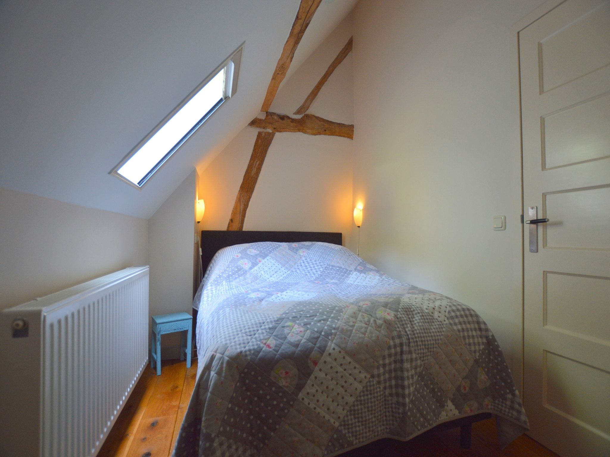 Een slaapkamer van Hoeve A Gen Water- Donderblumke in Slenaken