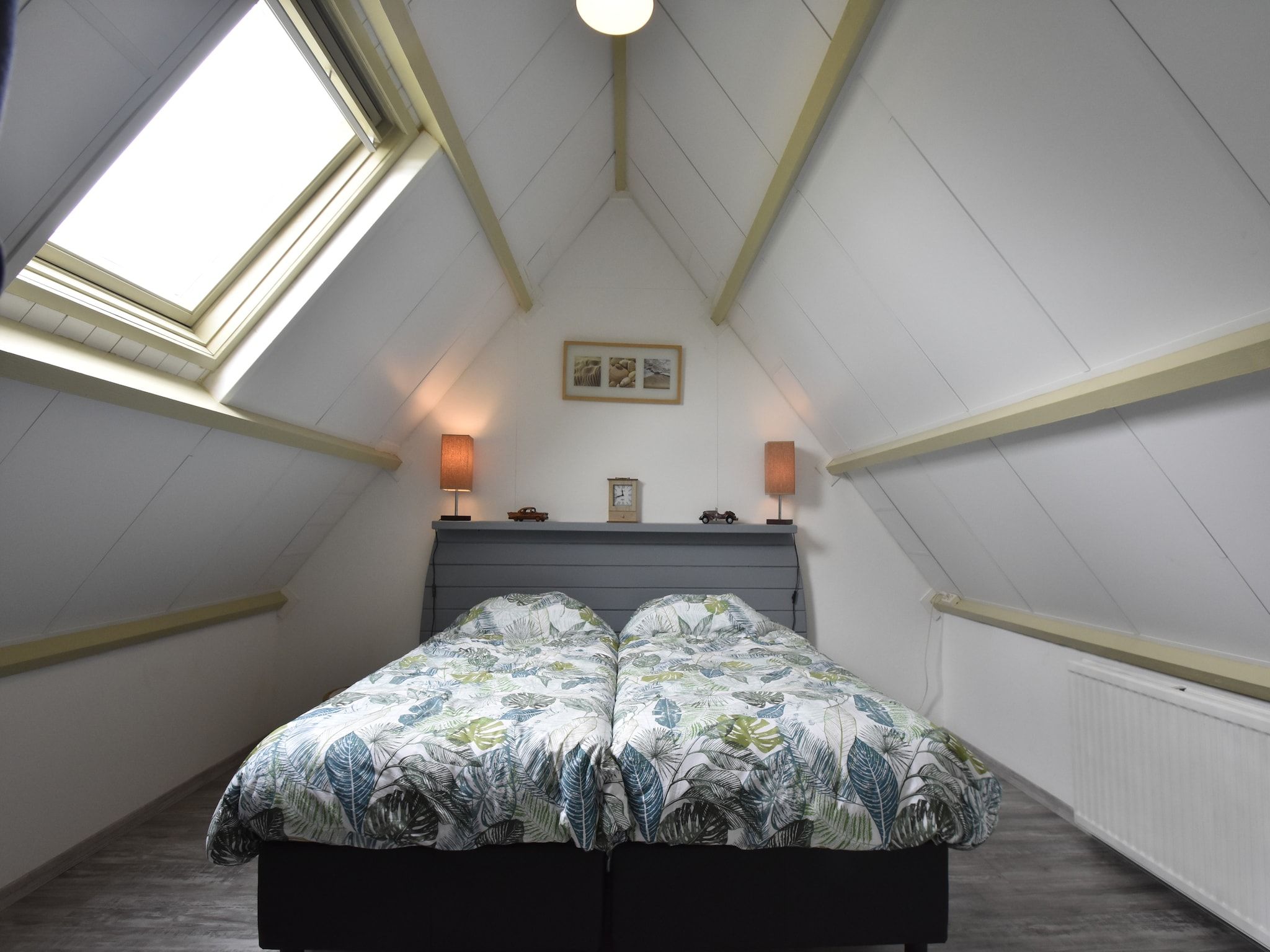 Een slaapkamer van Het Hoge Noorden in Hippolytushoef