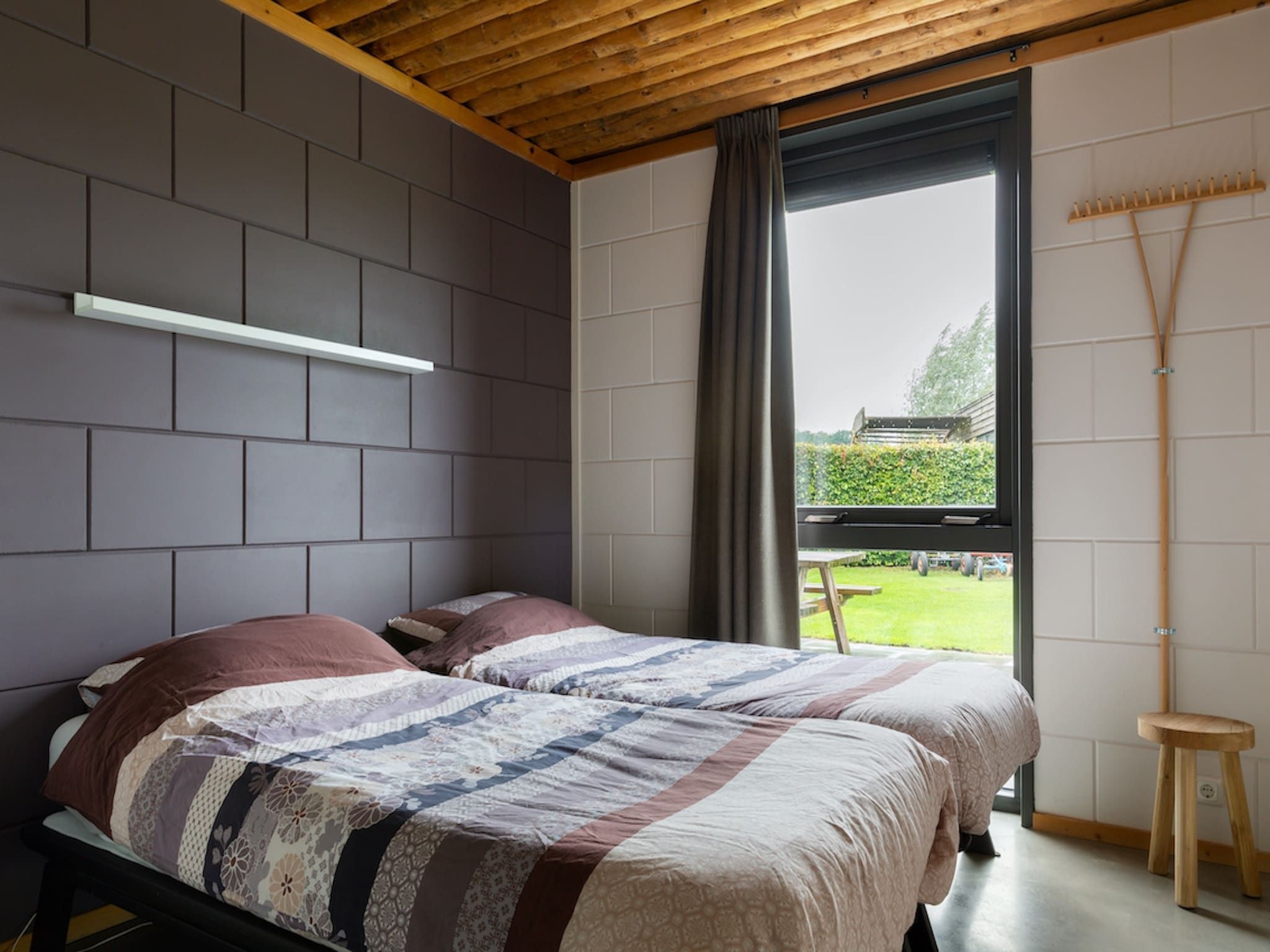 Een slaapkamer van Koe in de Kost 3 in Heeten
