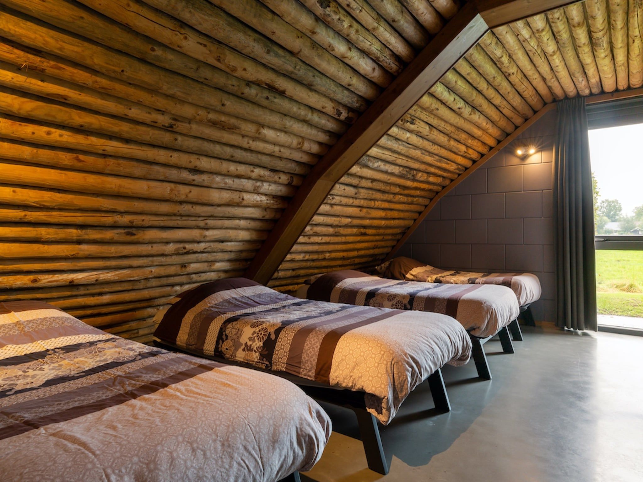 Een slaapkamer van Koe in de Kost 3 in Heeten