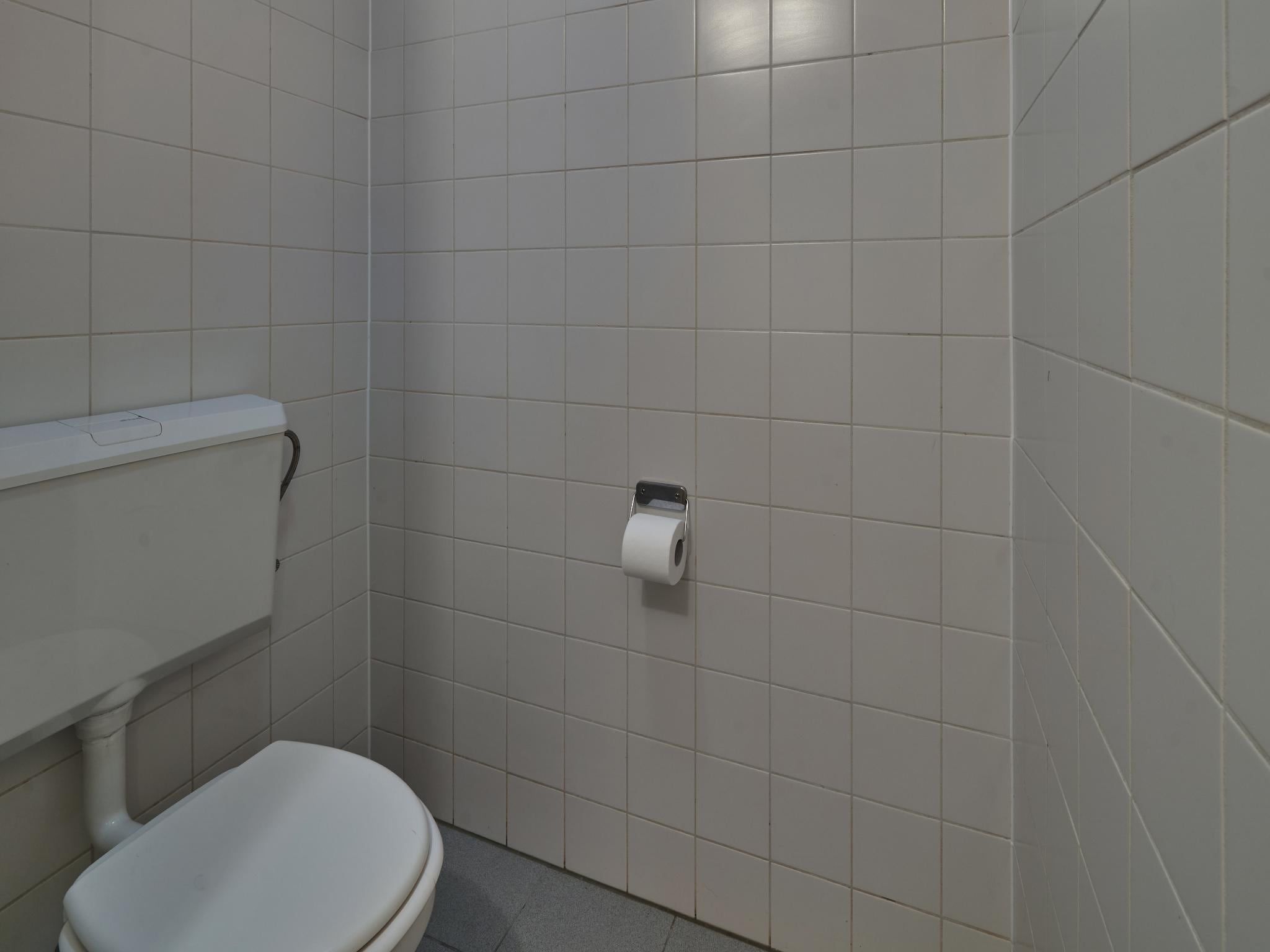 Een slaapkamer van Meschermolen 1 in Mesch-Eijsden