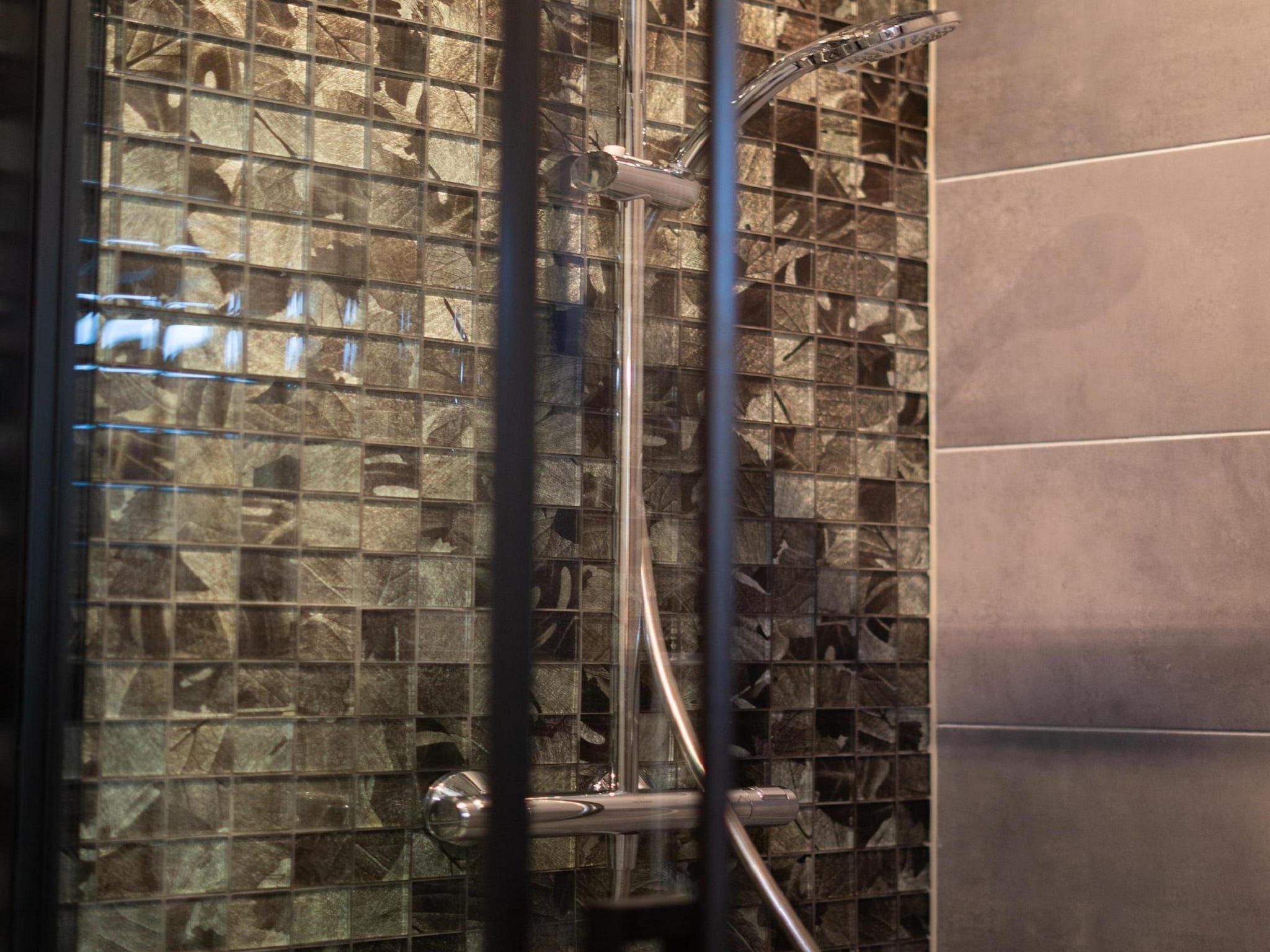 De badkamer van Vakantiepark De Rimboe & De Woeste Hoogte 3 in Hoenderloo