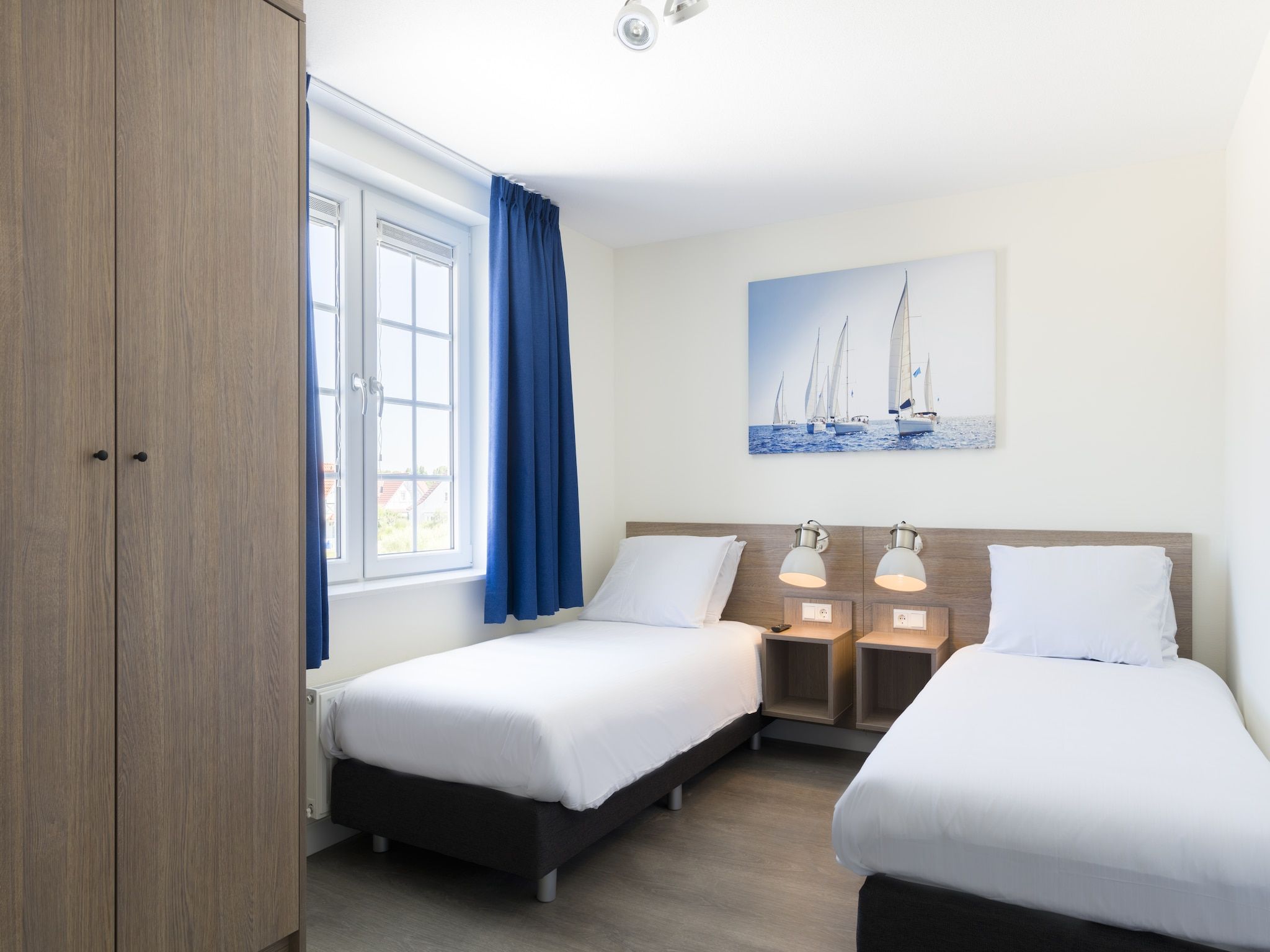 Een slaapkamer van Resort De Parade in Cadzand-Bad