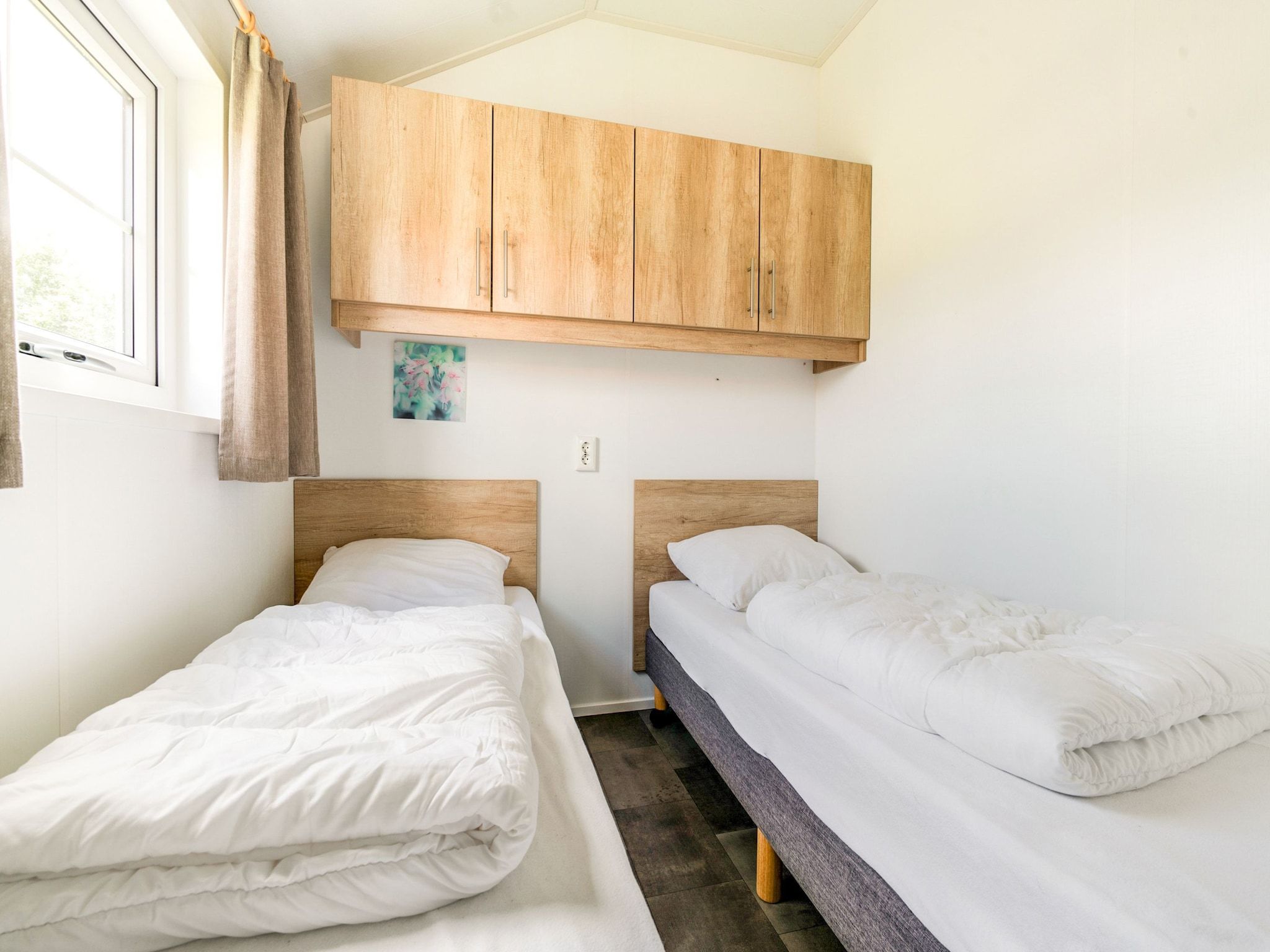 Een slaapkamer van Vakantiepark Eigen Wijze 6 in Bant