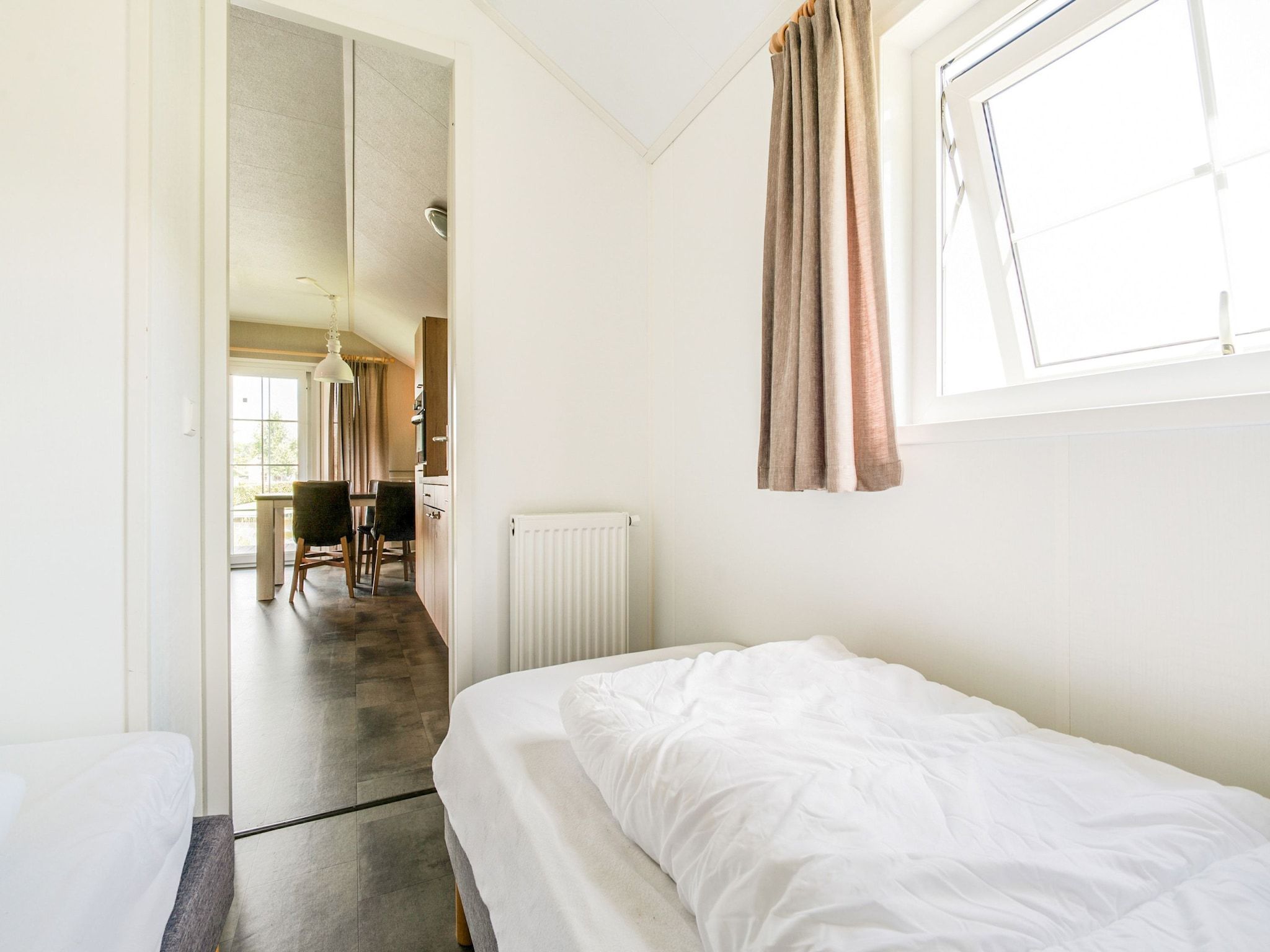 Een slaapkamer van Vakantiepark Eigen Wijze 6 in Bant