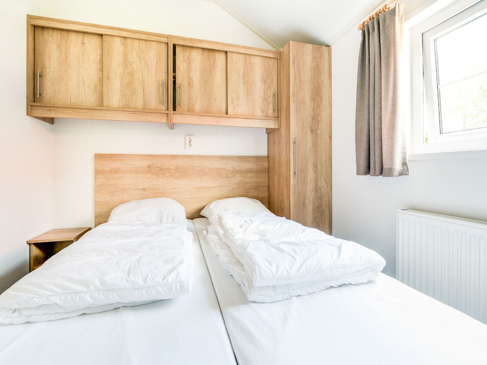 Een slaapkamer van Vakantiepark Eigen Wijze 6 in Bant