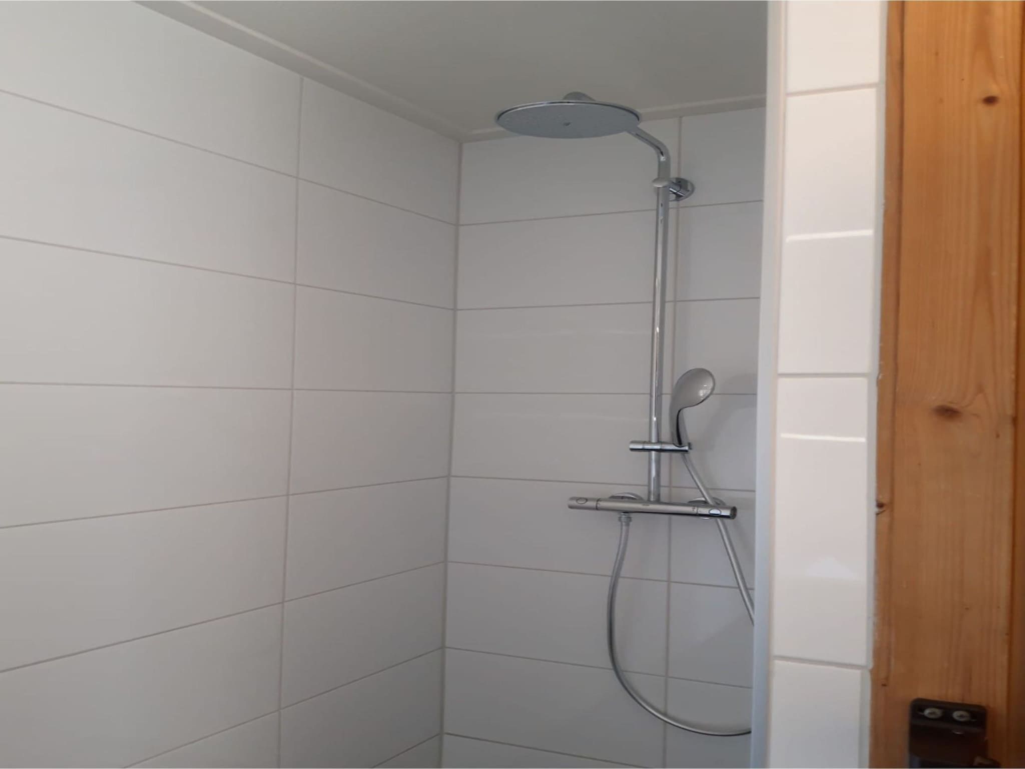 De badkamer van Sophiaboulevard 15 in Kamperland