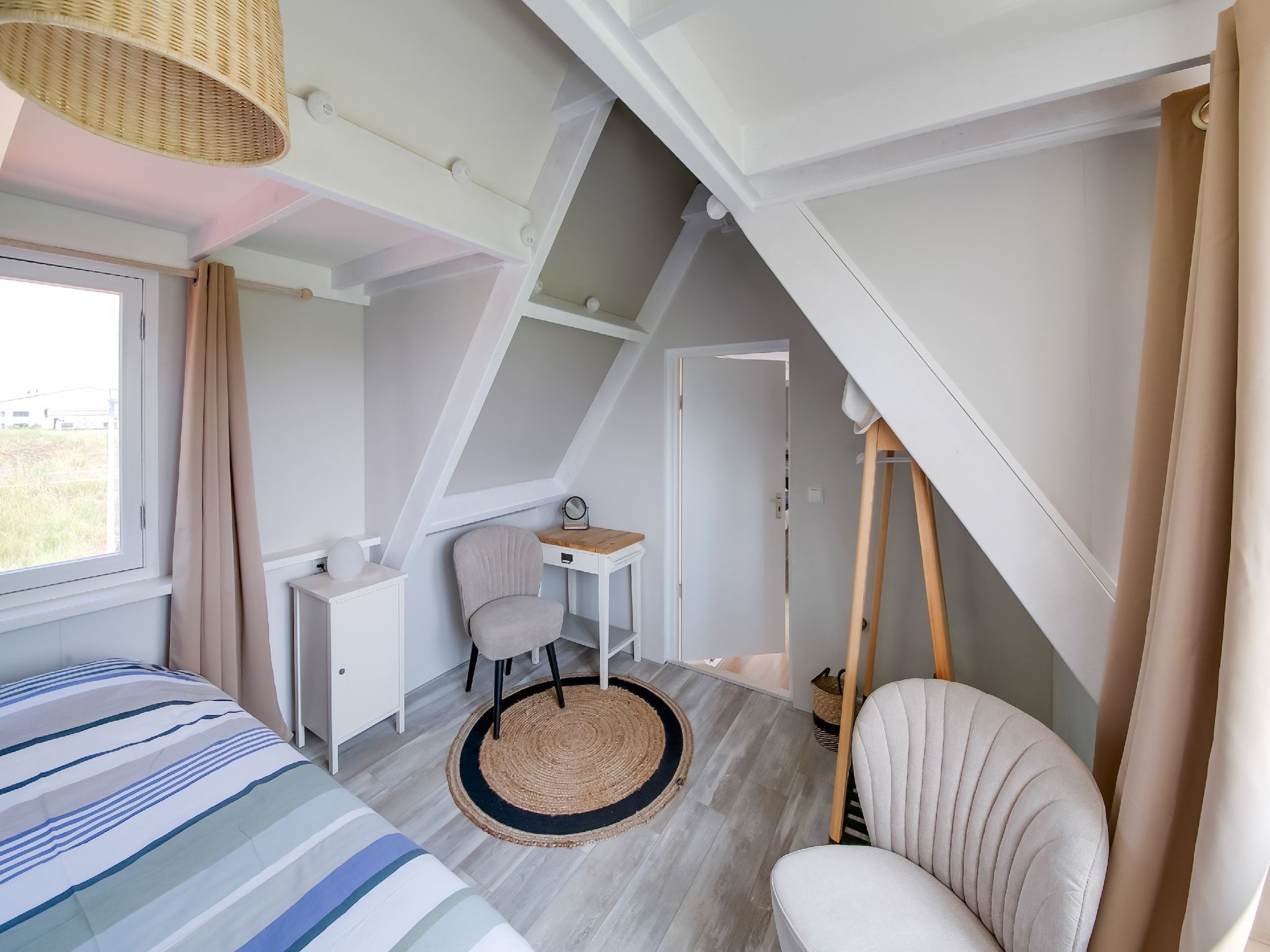 Een slaapkamer van Storm Bries in Callantsoog