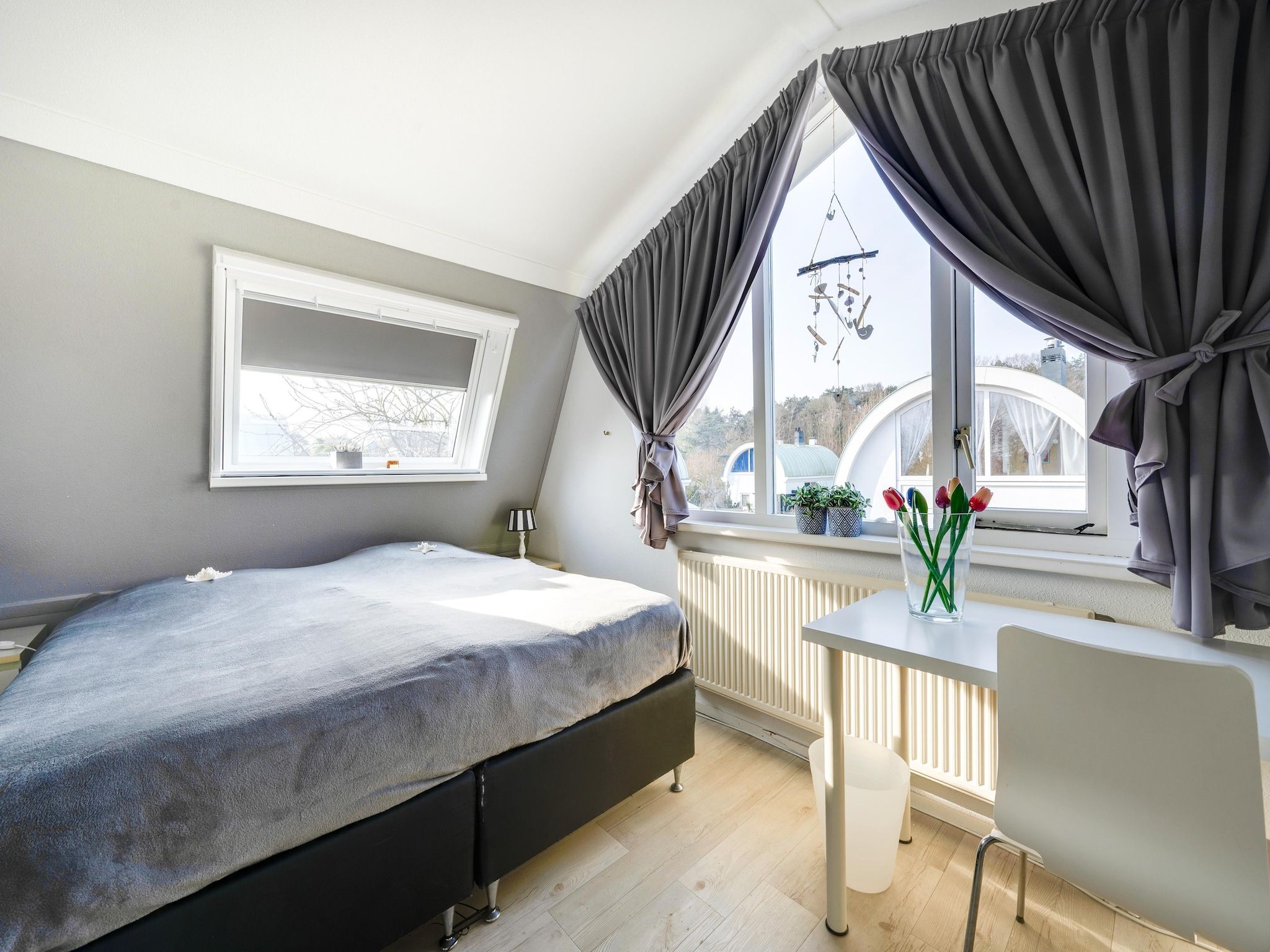 Een slaapkamer van De Zilvermeeuw in Noordwijk