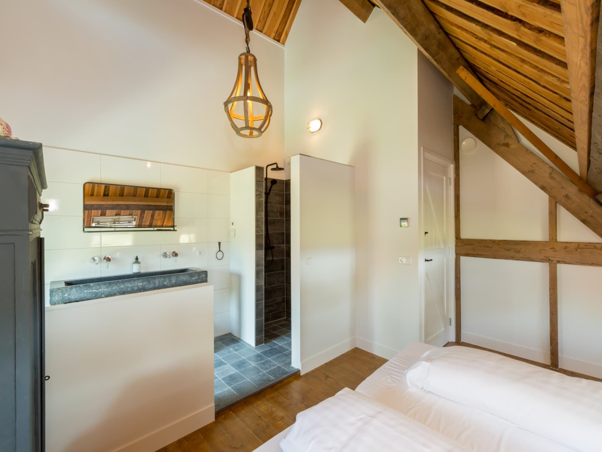 Een slaapkamer van Familiehuis - Lepelstraat 18AB  Vrouwenpolder in Vrouwenpolder