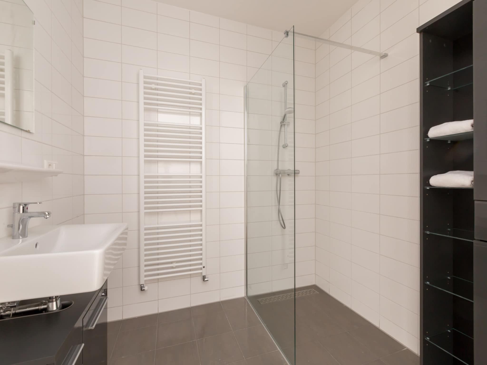 De badkamer van Aparthotel Zoutelande - 6 pers luxe appartement in Zoutelande