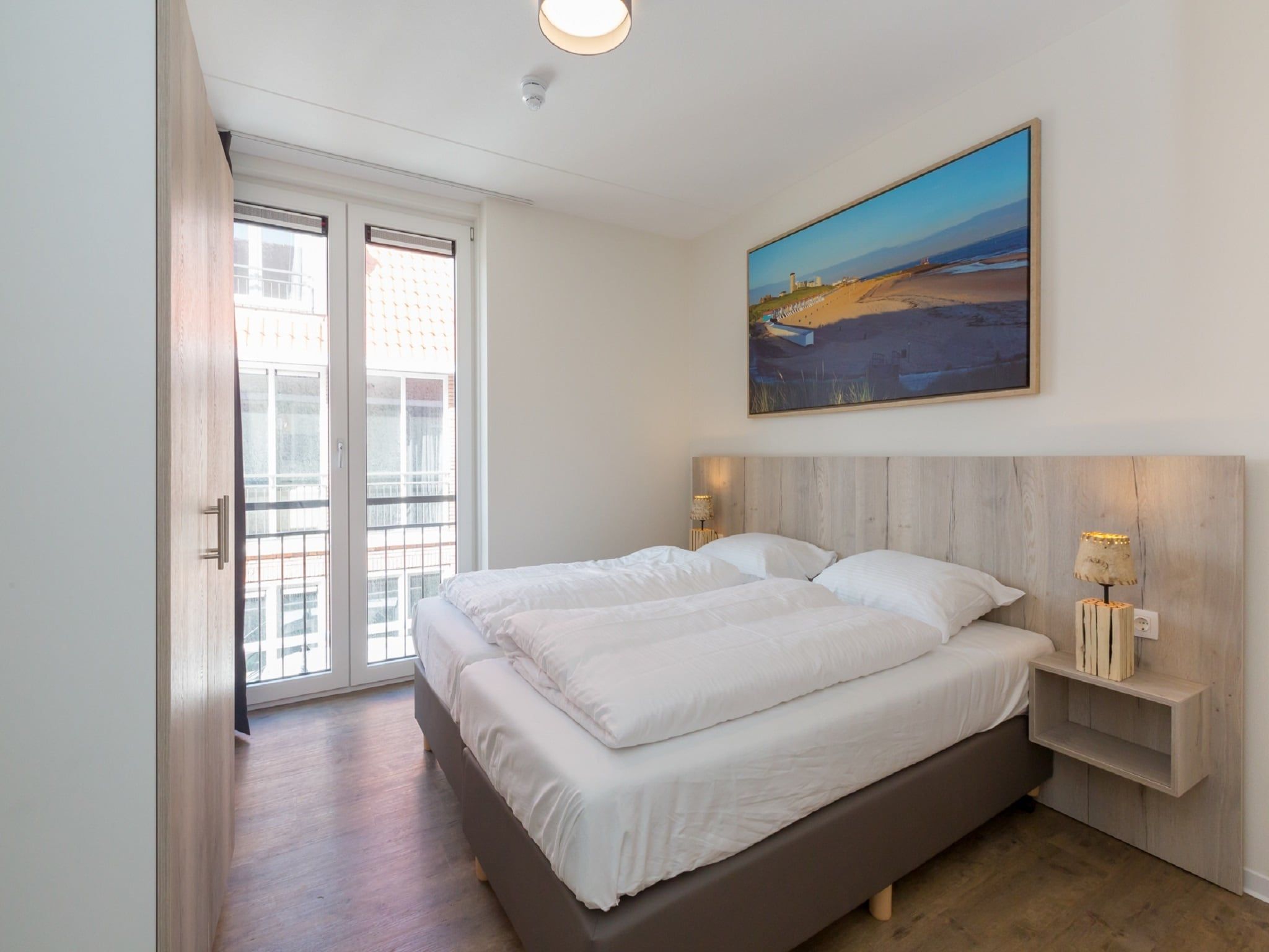 Een slaapkamer van Aparthotel Zoutelande - 6 pers luxe appartement in Zoutelande