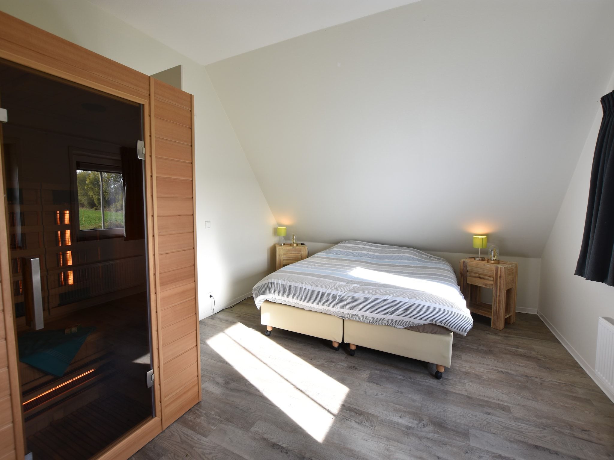 Een slaapkamer van Krokus 10 in Breskens