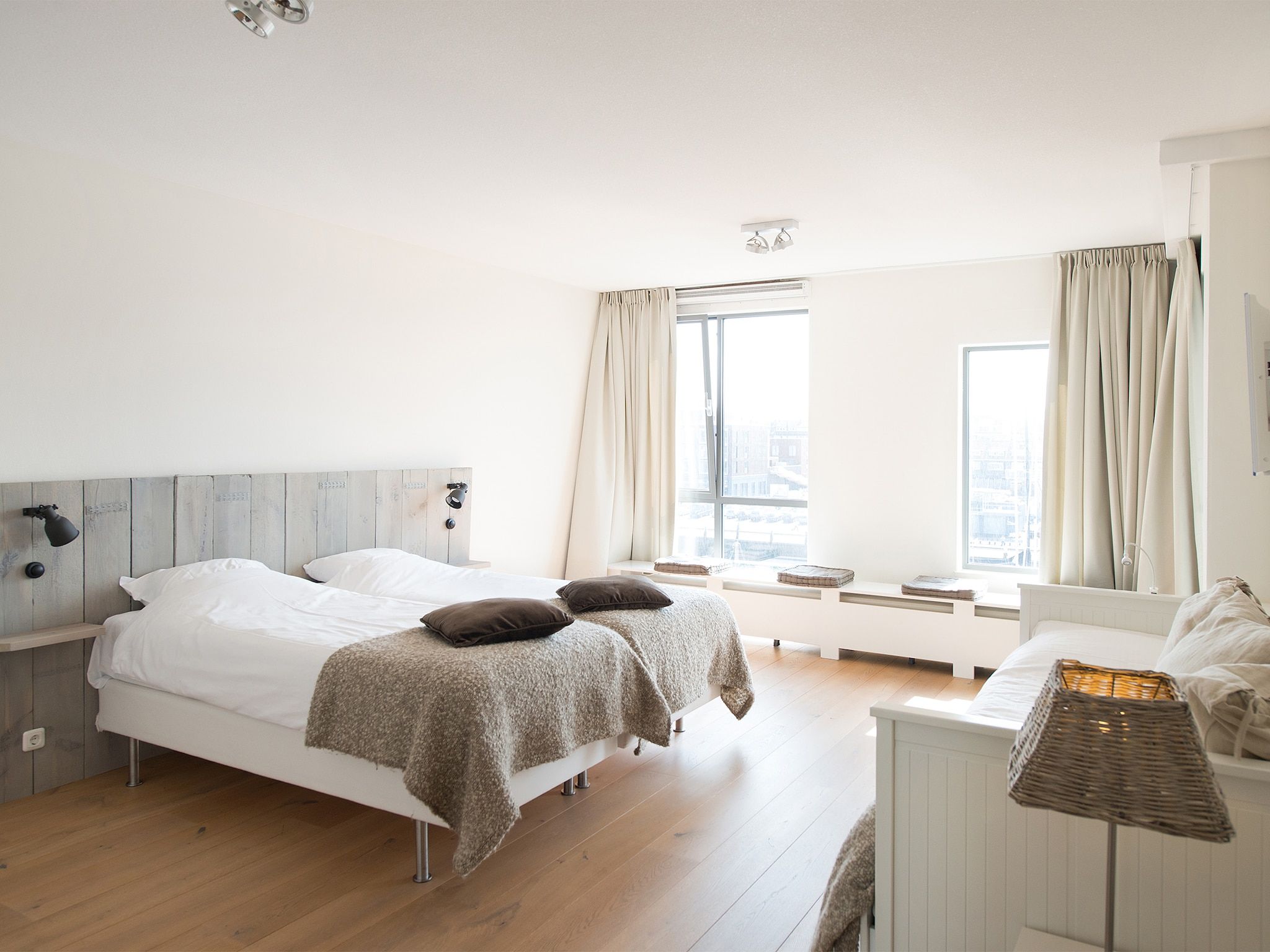 Een slaapkamer van Scheveningen Harbour 24a in Scheveningen