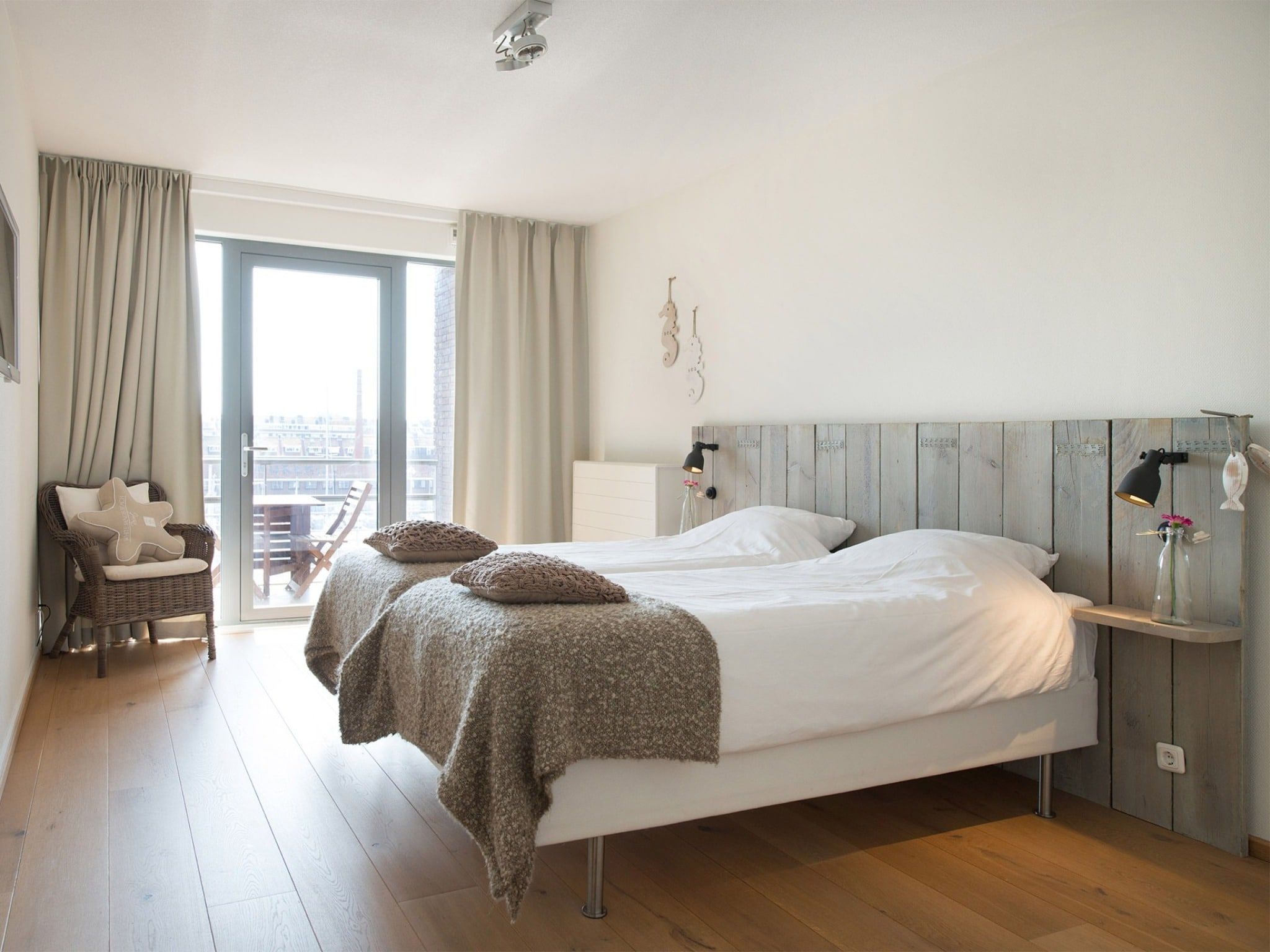 Een slaapkamer van Scheveningen Harbour 24a in Scheveningen