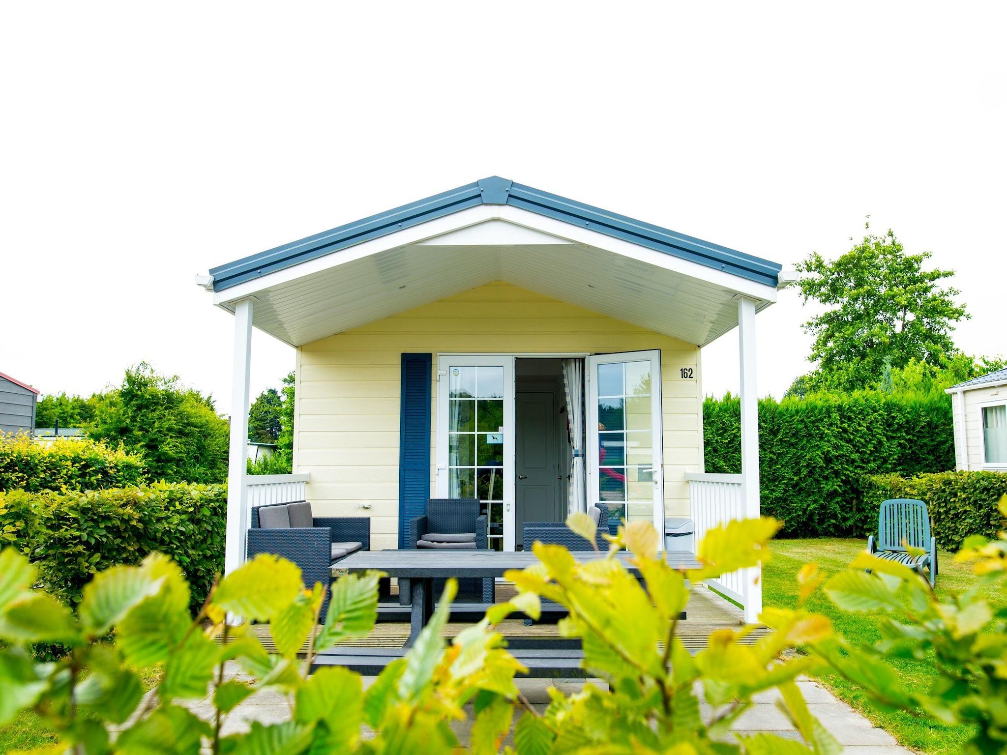 De buitenkant van Recreatiepark Duinhoeve 10 in Udenhout