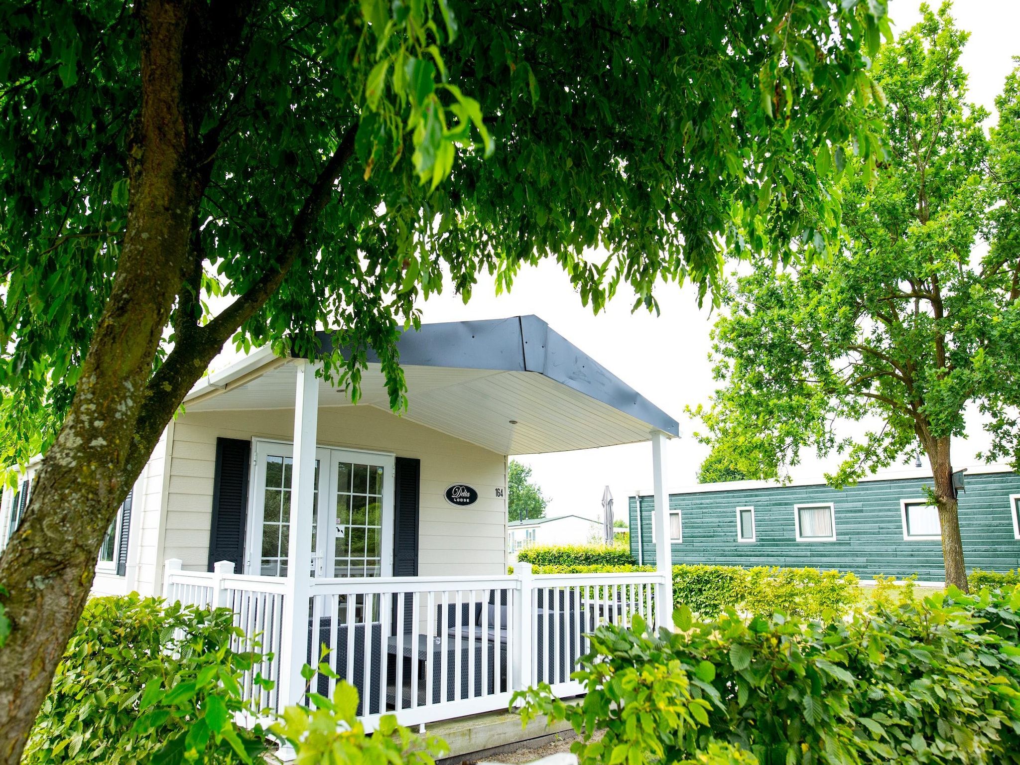 De buitenkant van Recreatiepark Duinhoeve 11 in Udenhout