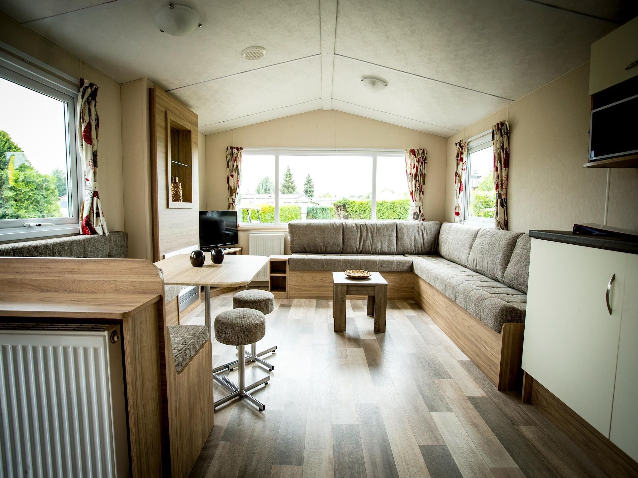 De woonkamer van Recreatiepark Duinhoeve 12 in Udenhout