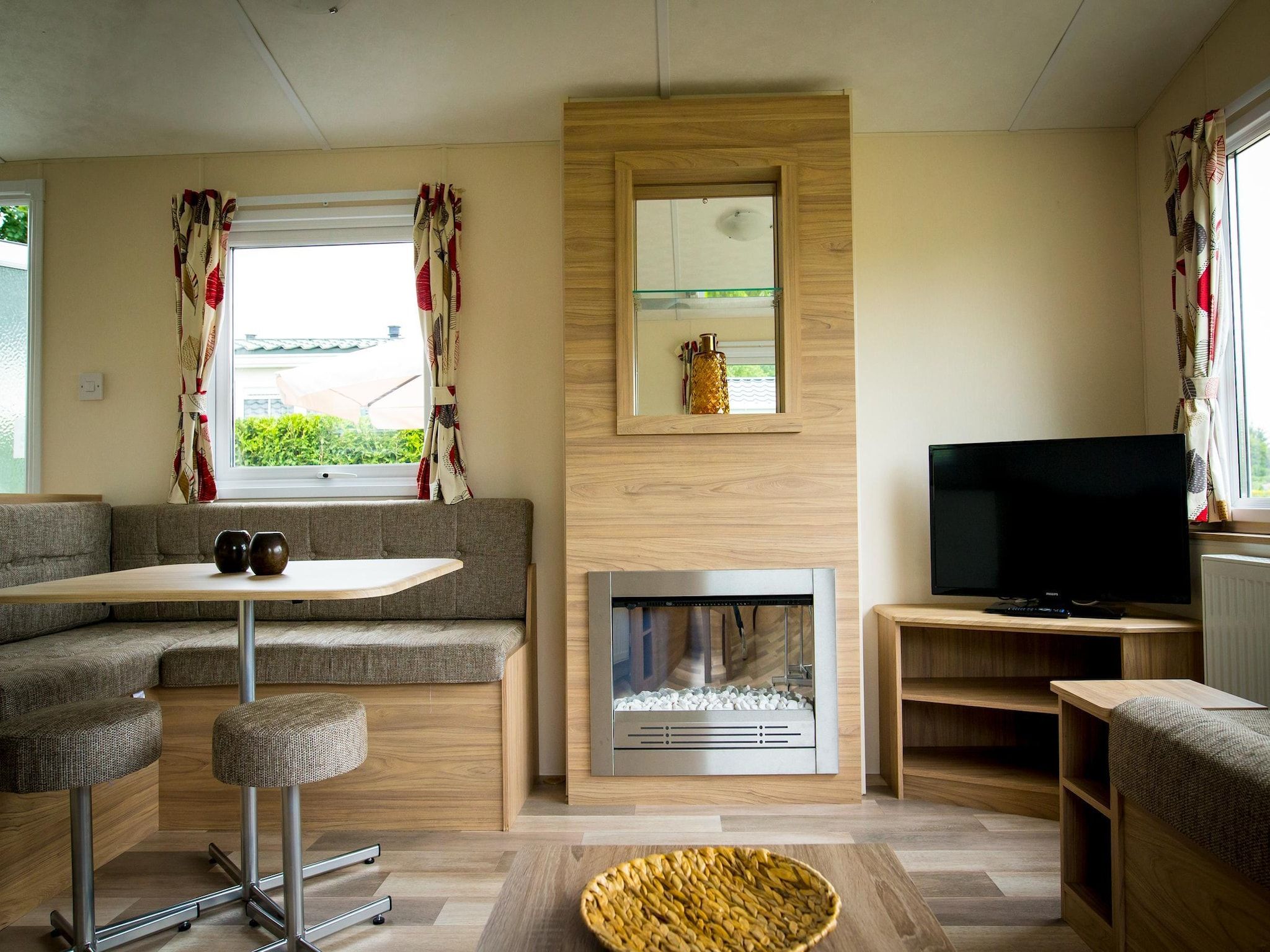 De woonkamer van Recreatiepark Duinhoeve 12 in Udenhout