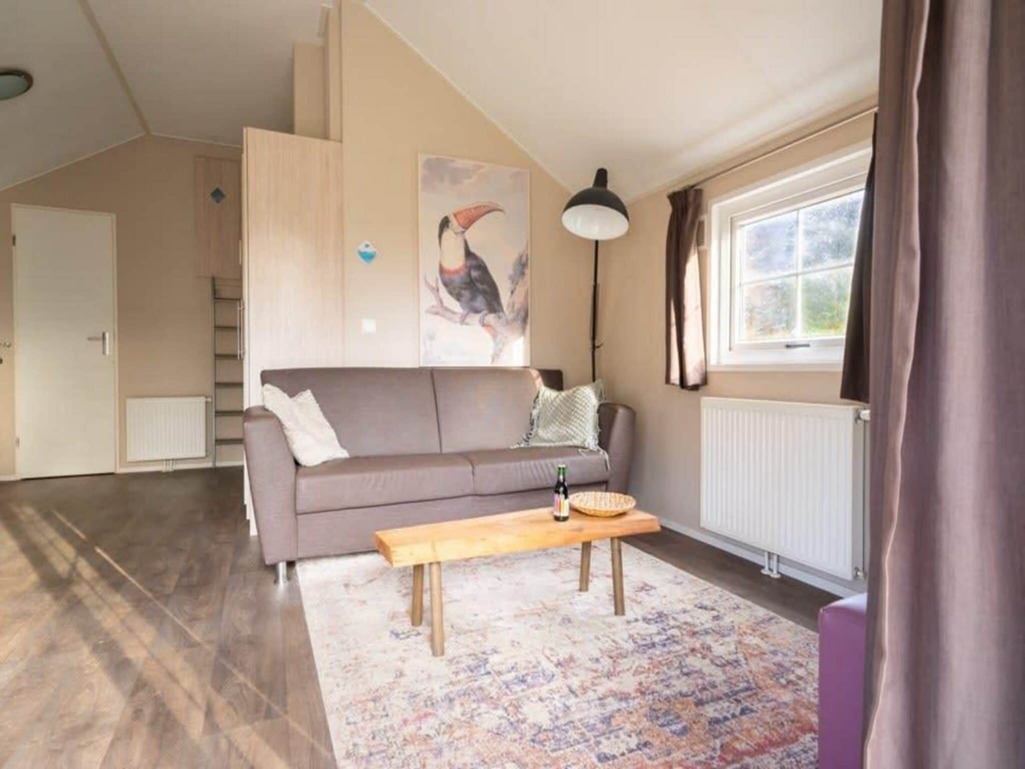 De woonkamer van Boslodge 6 in Otterlo