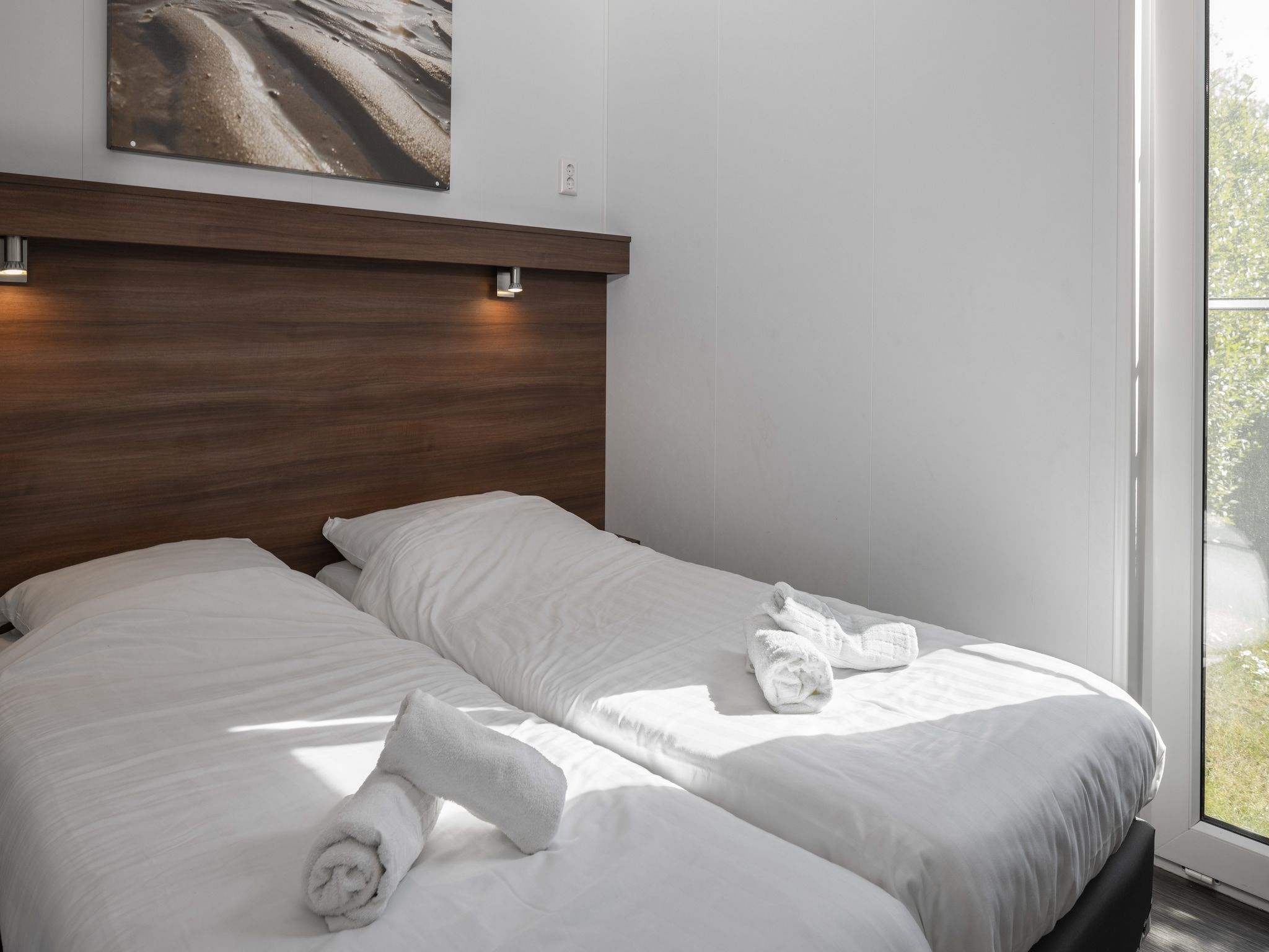 Een slaapkamer van Vakantiepark Zeebad 4 in Breskens