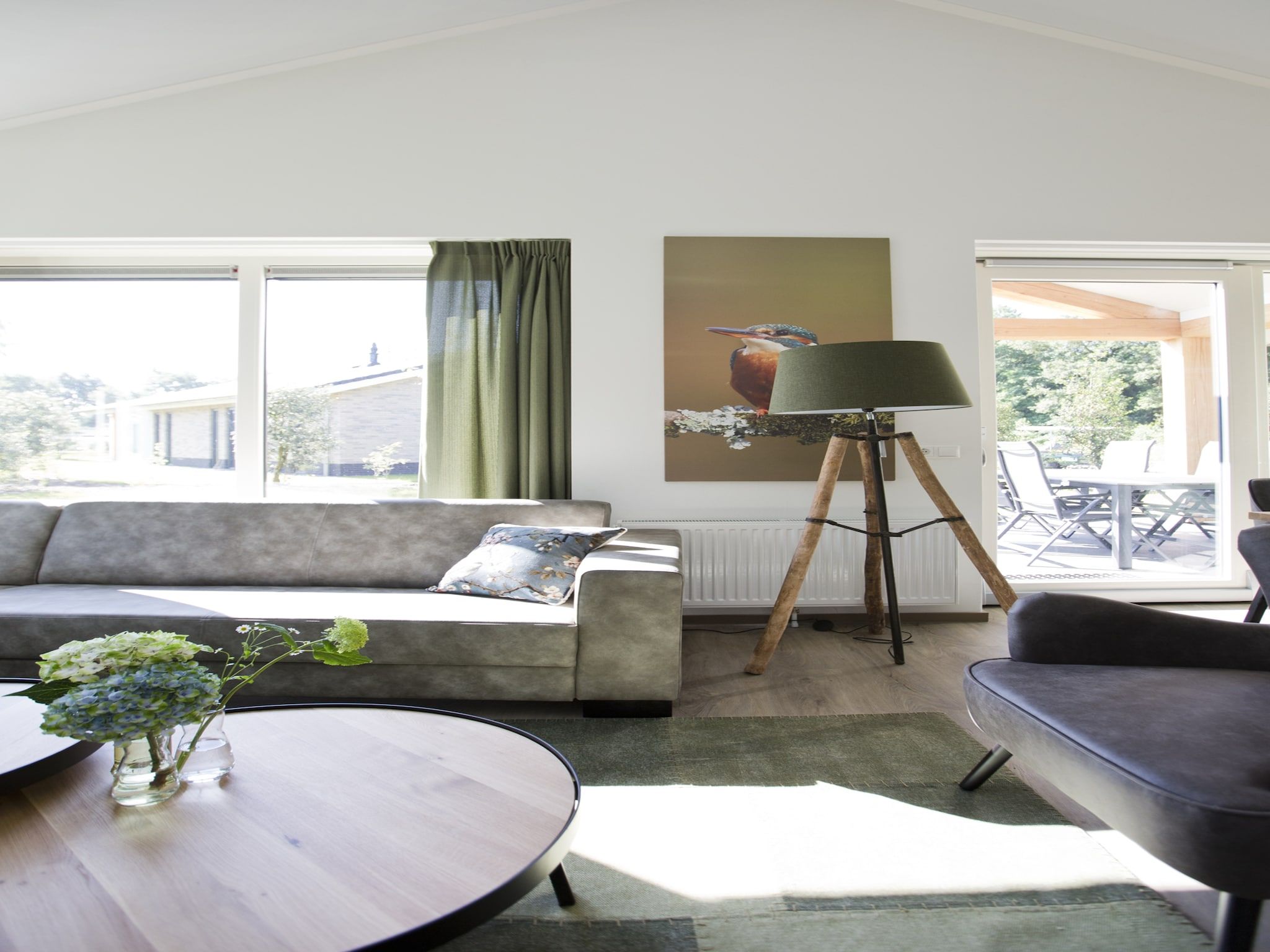 De woonkamer van Landgoed De IJsvogel 7 in Voorthuizen