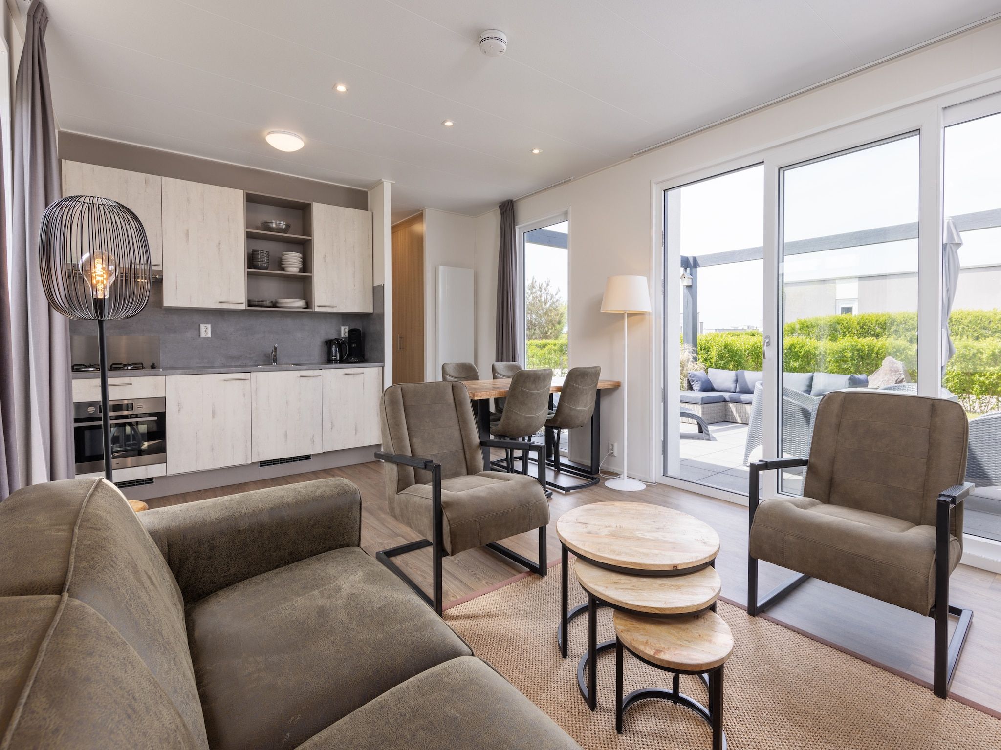 De woonkamer van Vakantiepark Callassande 1 in Callantsoog