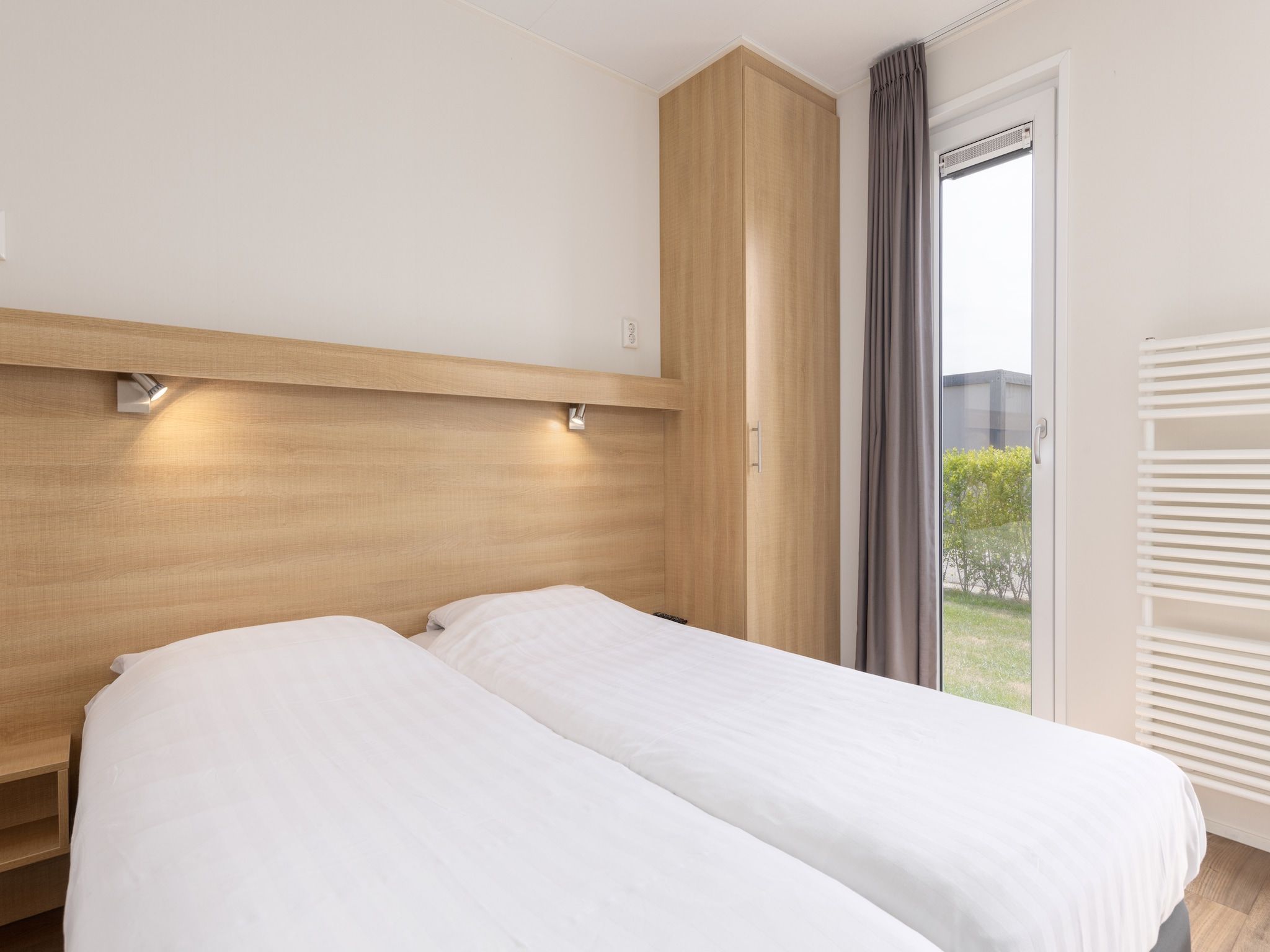 Een slaapkamer van Vakantiepark Callassande 1 in Callantsoog