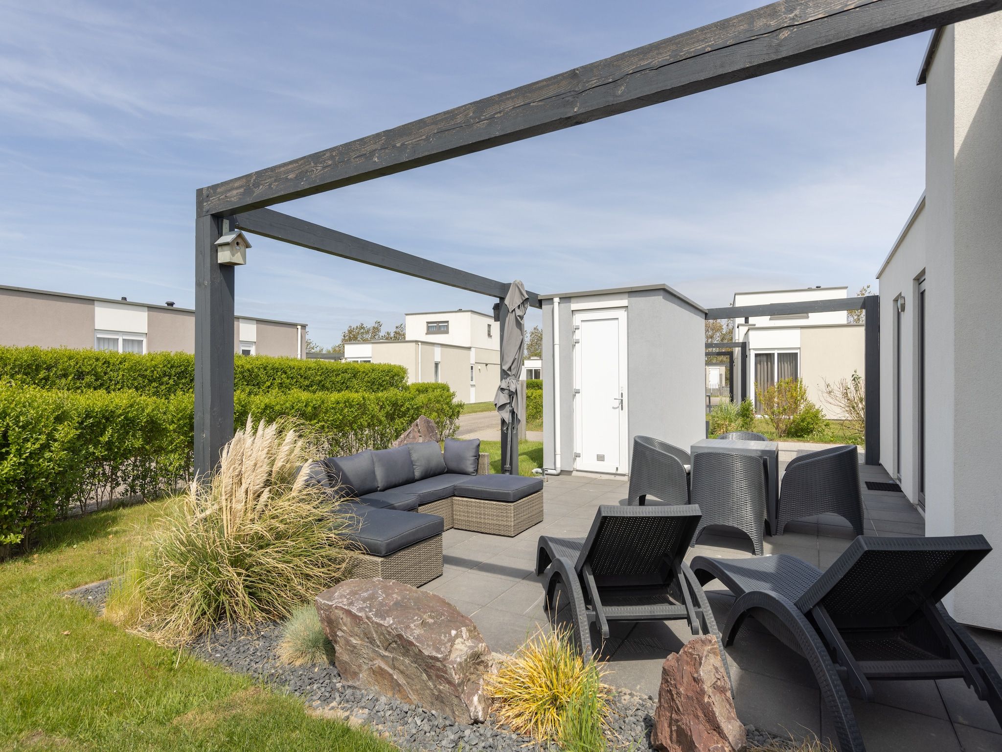 De tuin van Vakantiepark Callassande 1 in Callantsoog