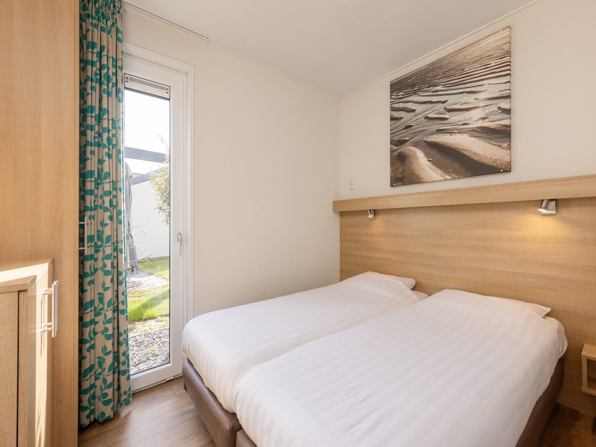 Een slaapkamer van Vakantiepark Callassande 2 in Callantsoog