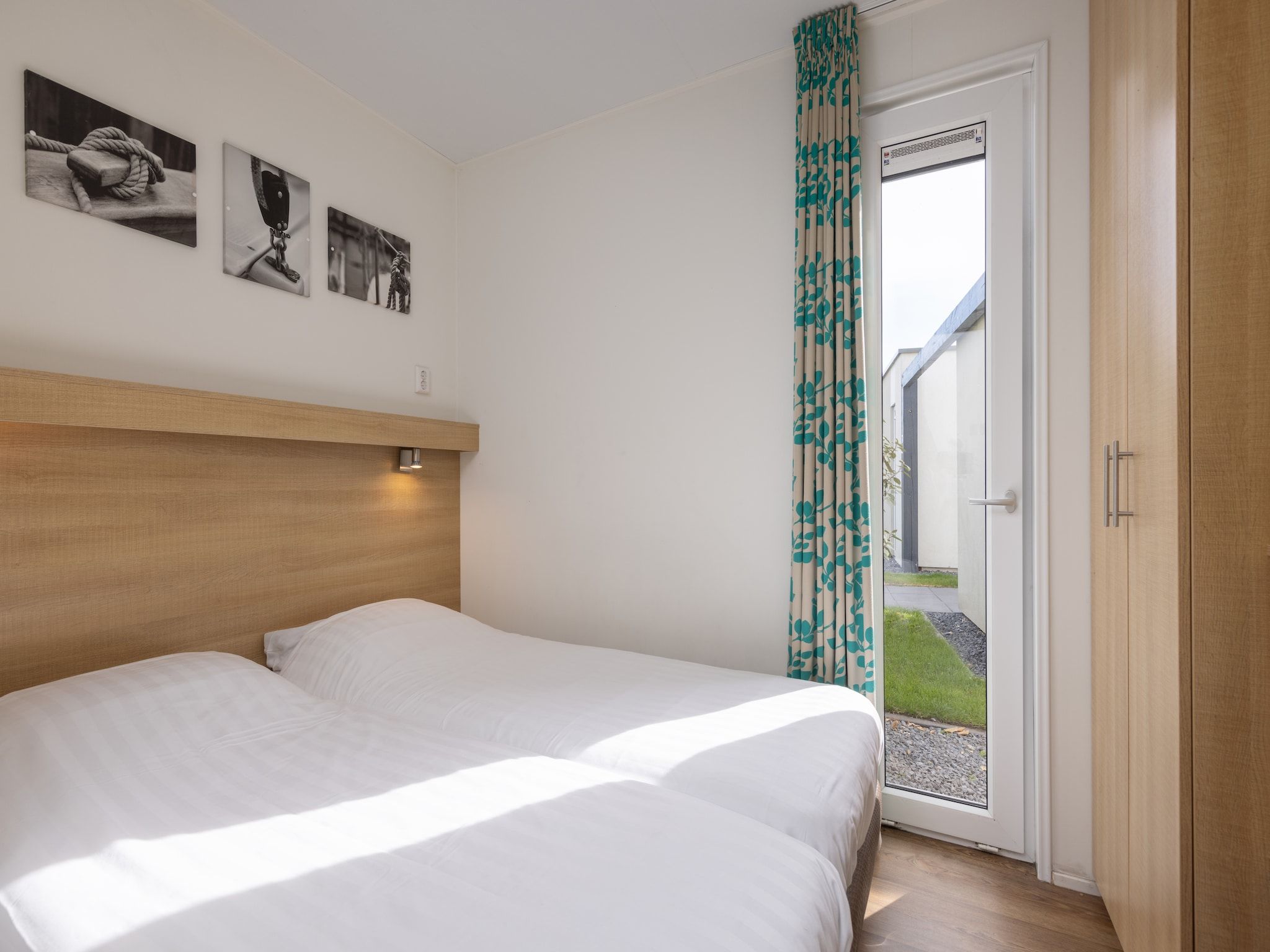 Een slaapkamer van Vakantiepark Callassande 2 in Callantsoog