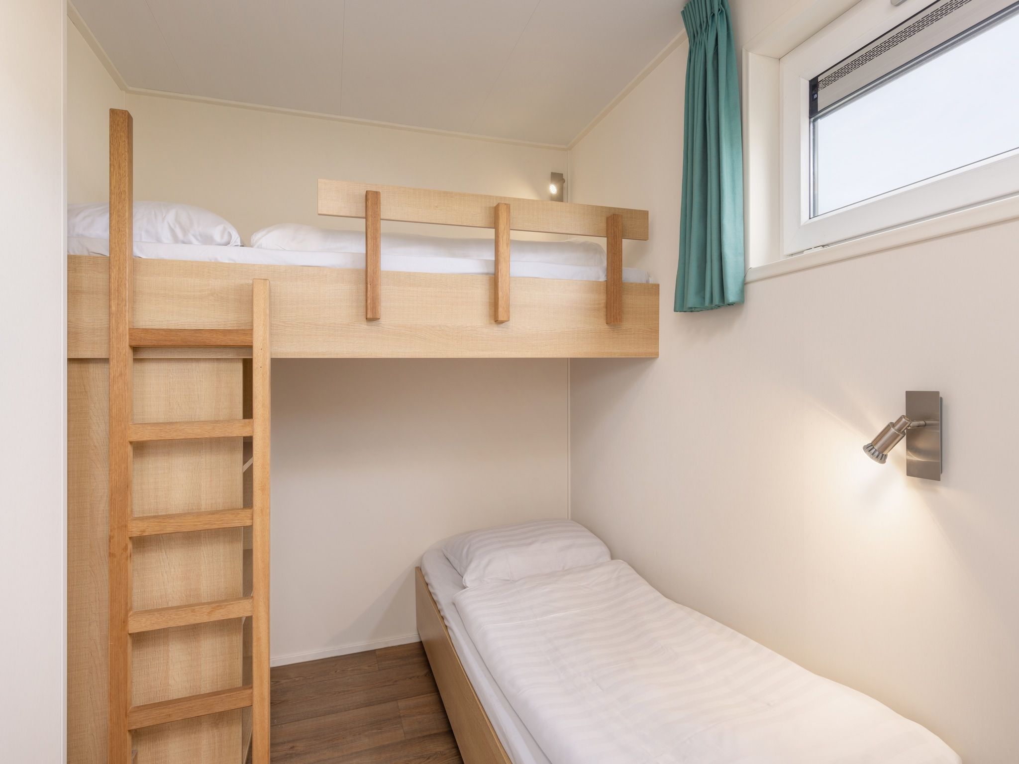 Een slaapkamer van Vakantiepark Callassande 3 in Callantsoog