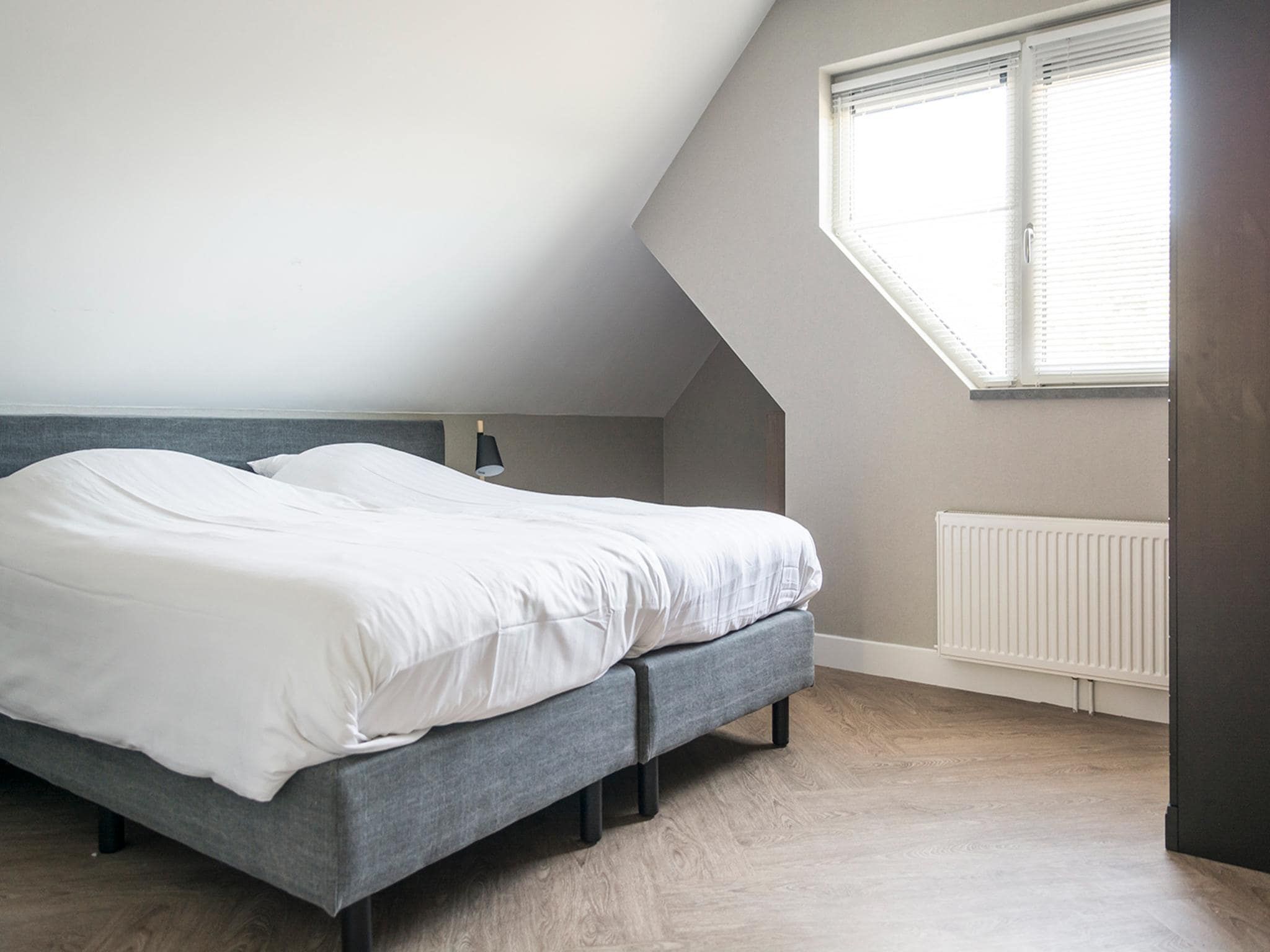 Een slaapkamer van Villa Bouwlust Z in De Cocksdorp Texel